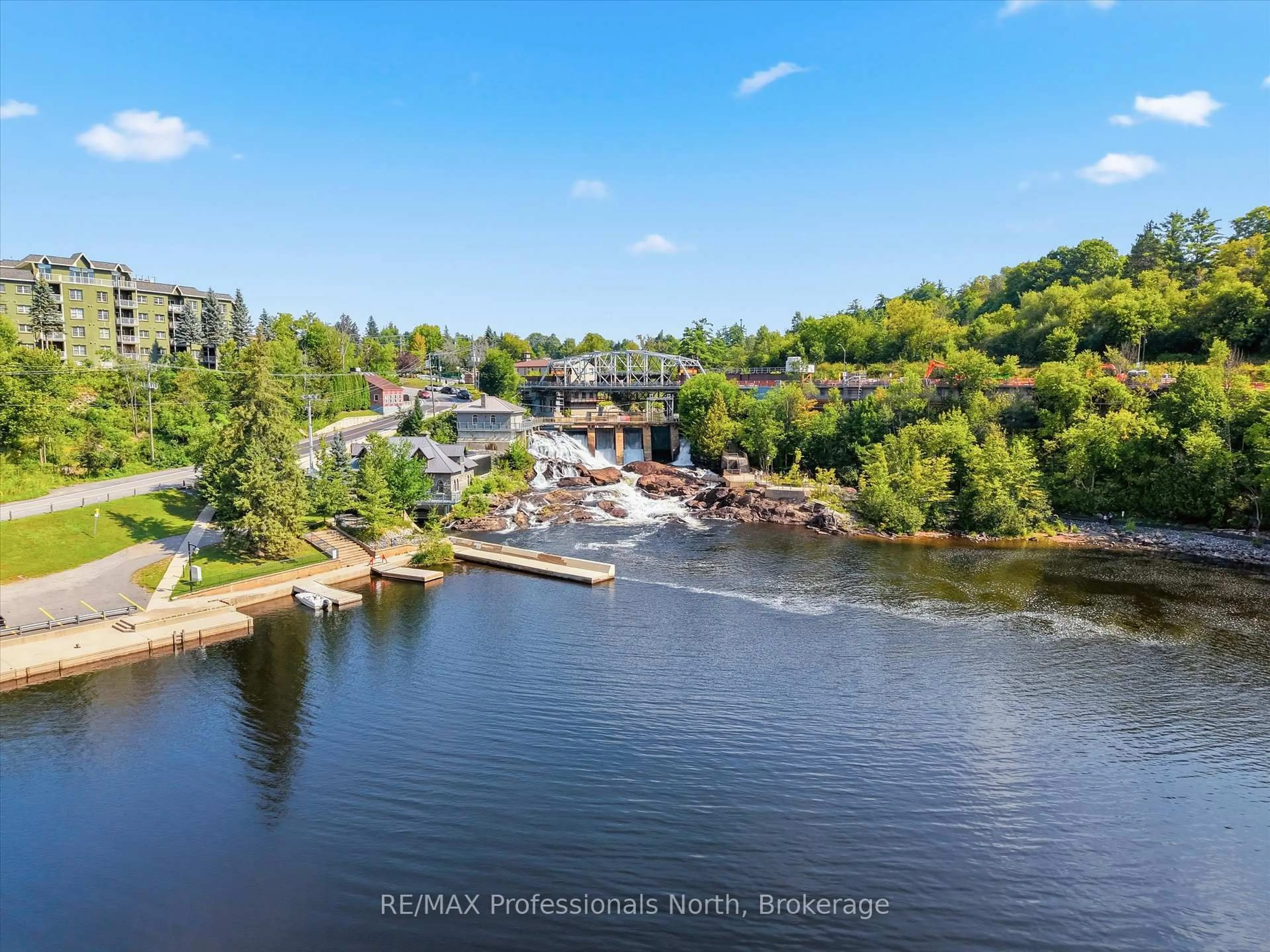 A pic from outside/outdoor area/front of a property/back of a property/a pic from drone, water/lake/river/ocean view for 10A Kimberley Ave #501, Bracebridge Ontario P1L 0A4