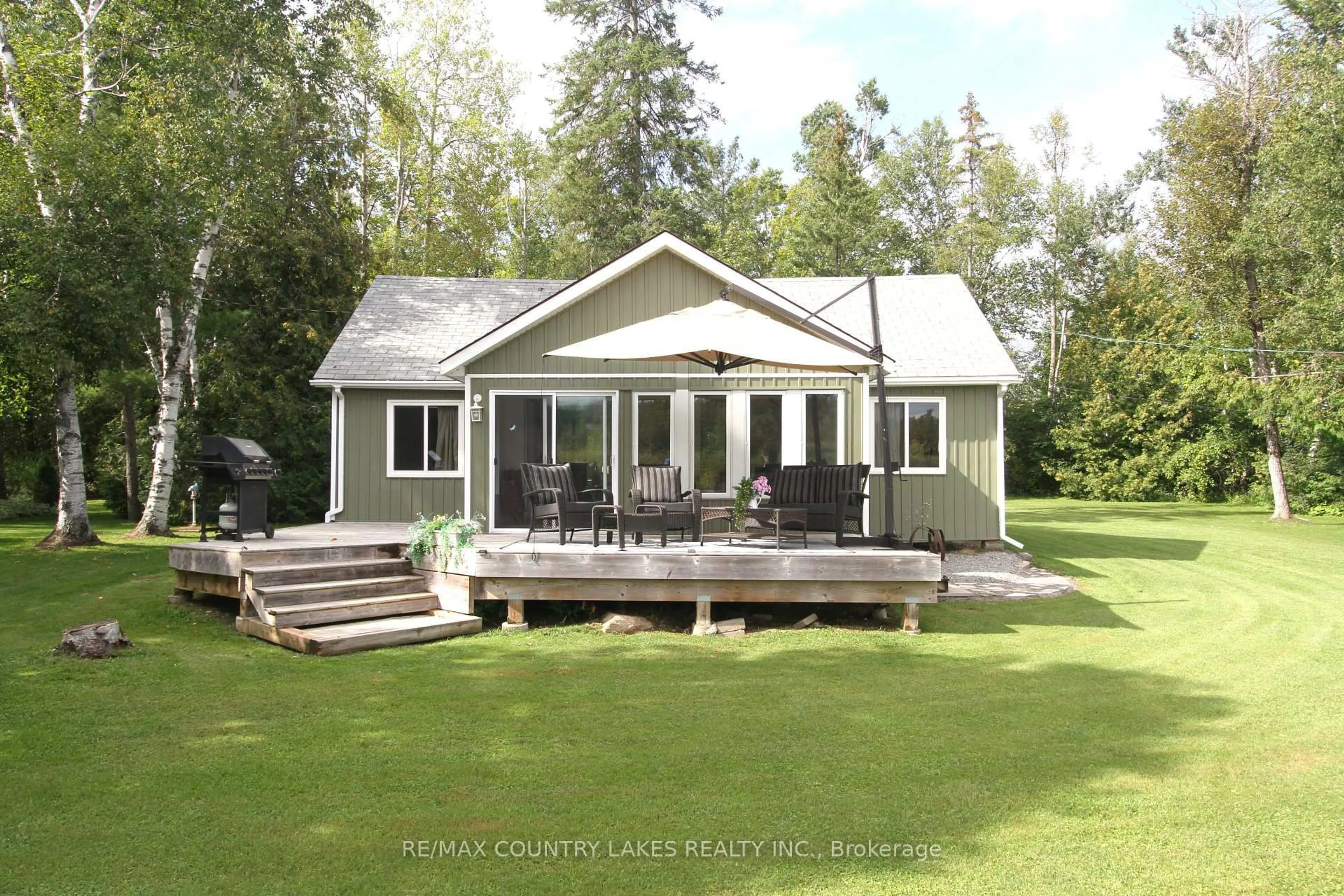 Home with vinyl exterior material, unknown for 129 McGuire Beach Rd, Kawartha Lakes Ontario K0M 2B0