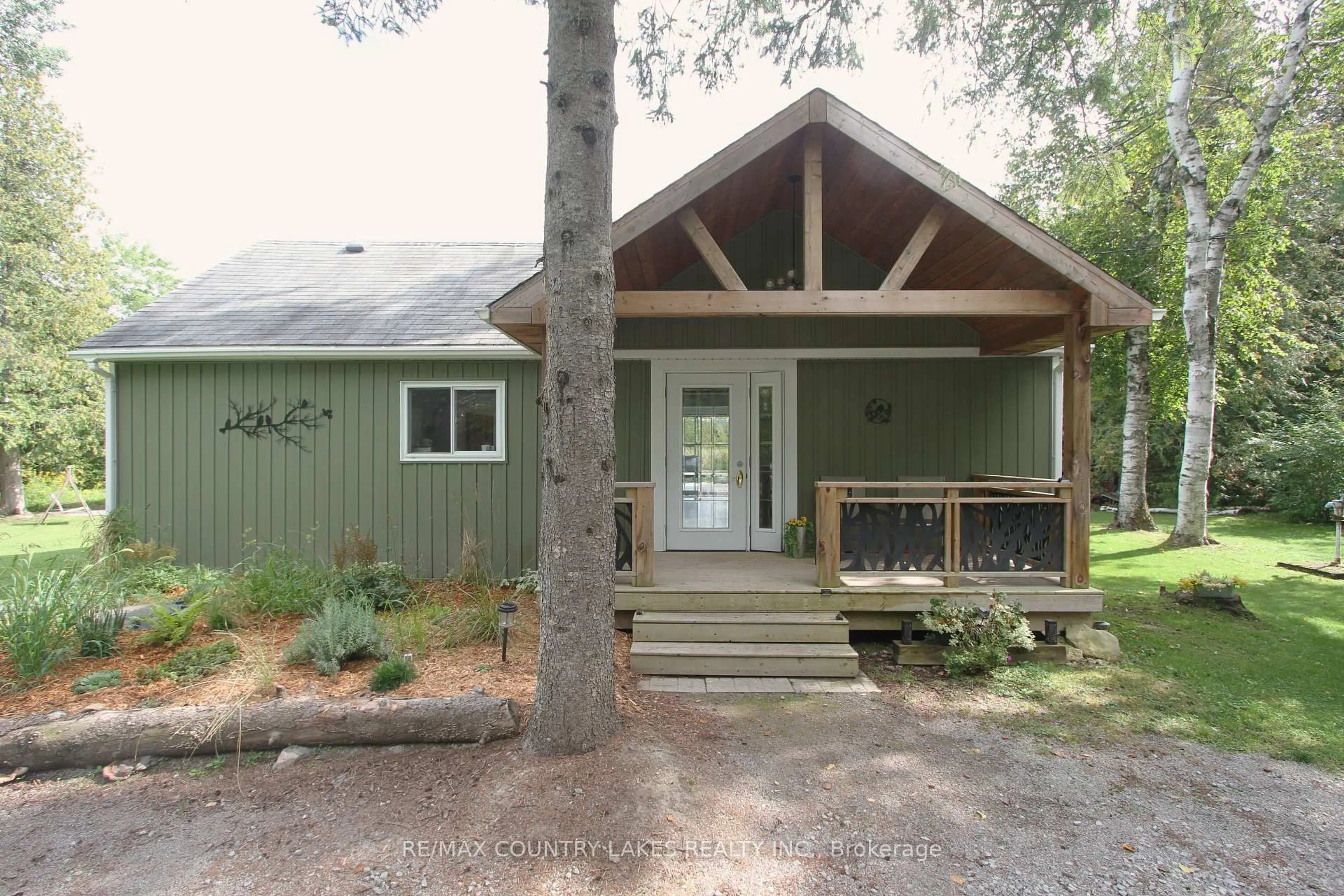 Home with vinyl exterior material, unknown for 129 McGuire Beach Rd, Kawartha Lakes Ontario K0M 2B0