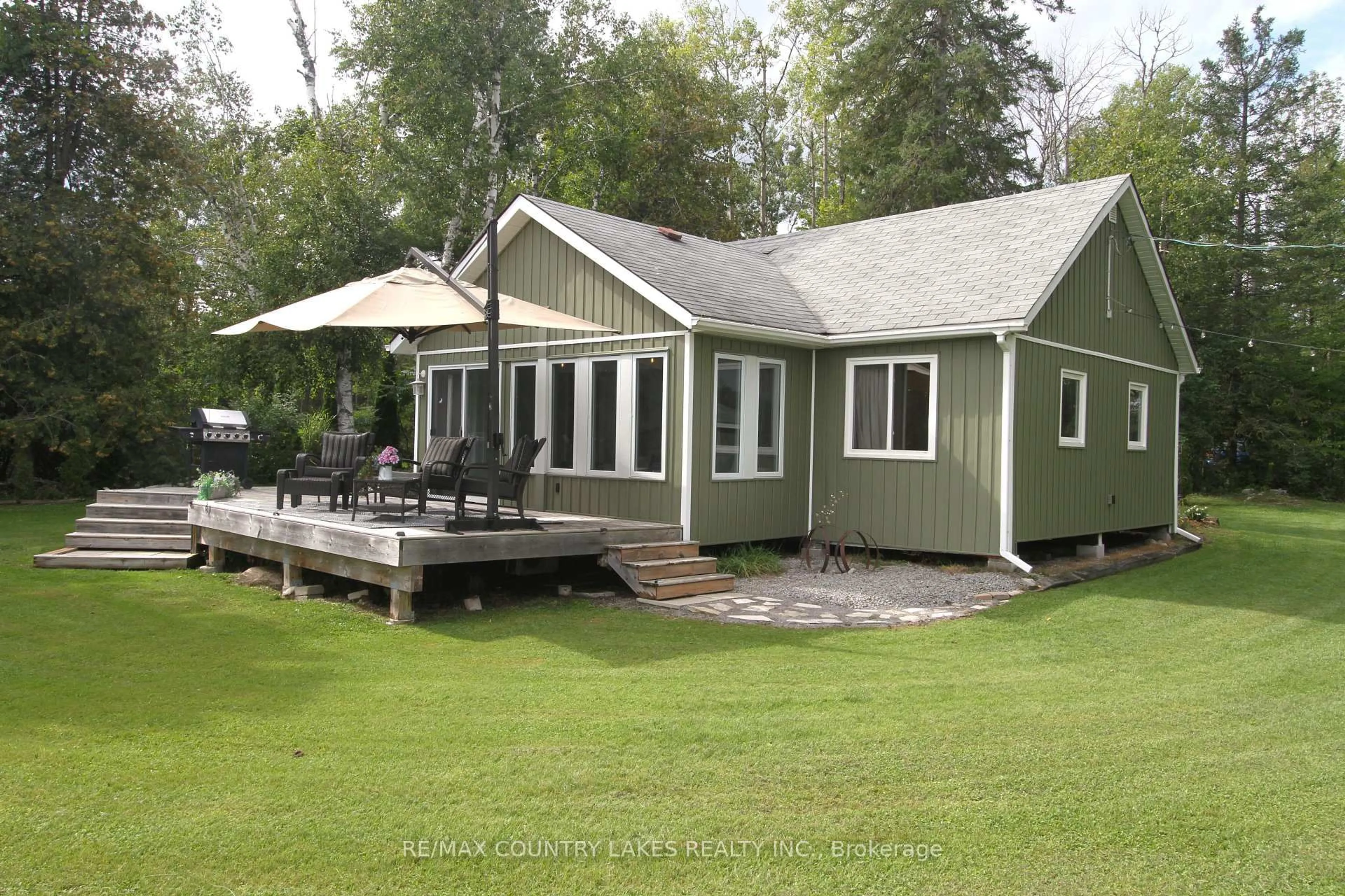 Home with vinyl exterior material, unknown for 129 McGuire Beach Rd, Kawartha Lakes Ontario K0M 2B0