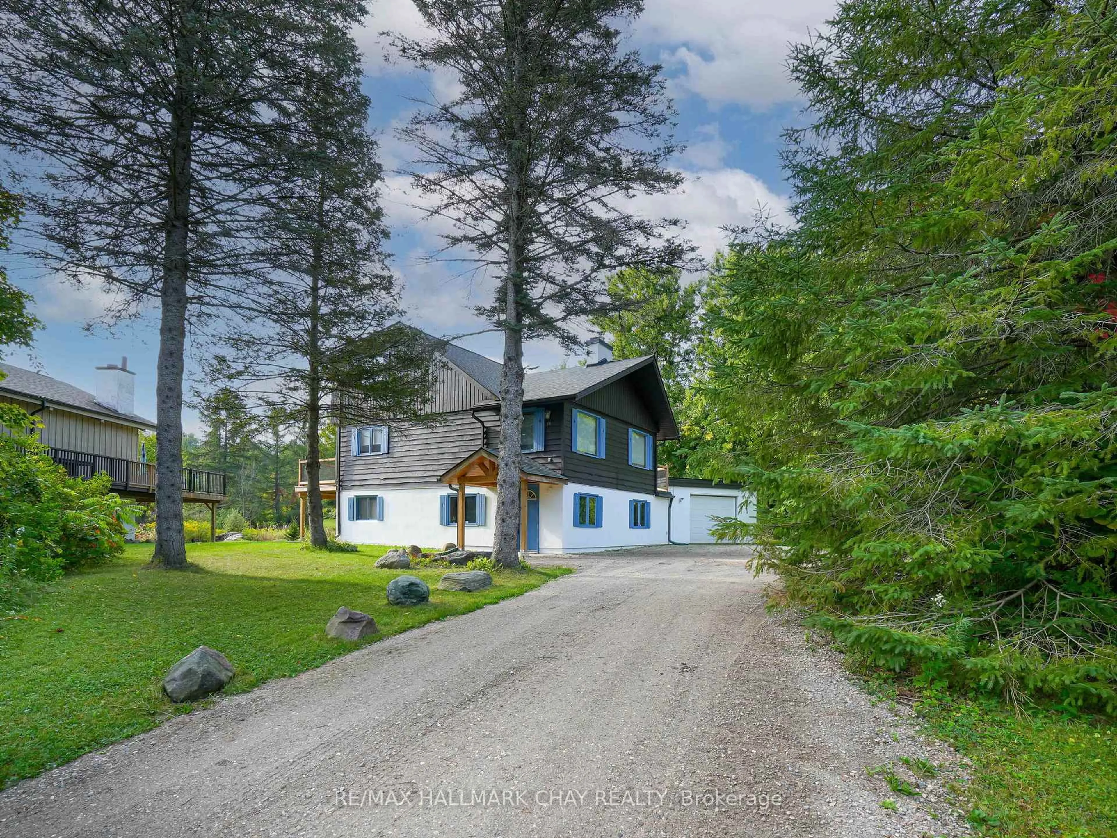 A pic from outside/outdoor area/front of a property/back of a property/a pic from drone, unknown for 61 Pine River Cres, Mulmur Ontario L9V 3H3
