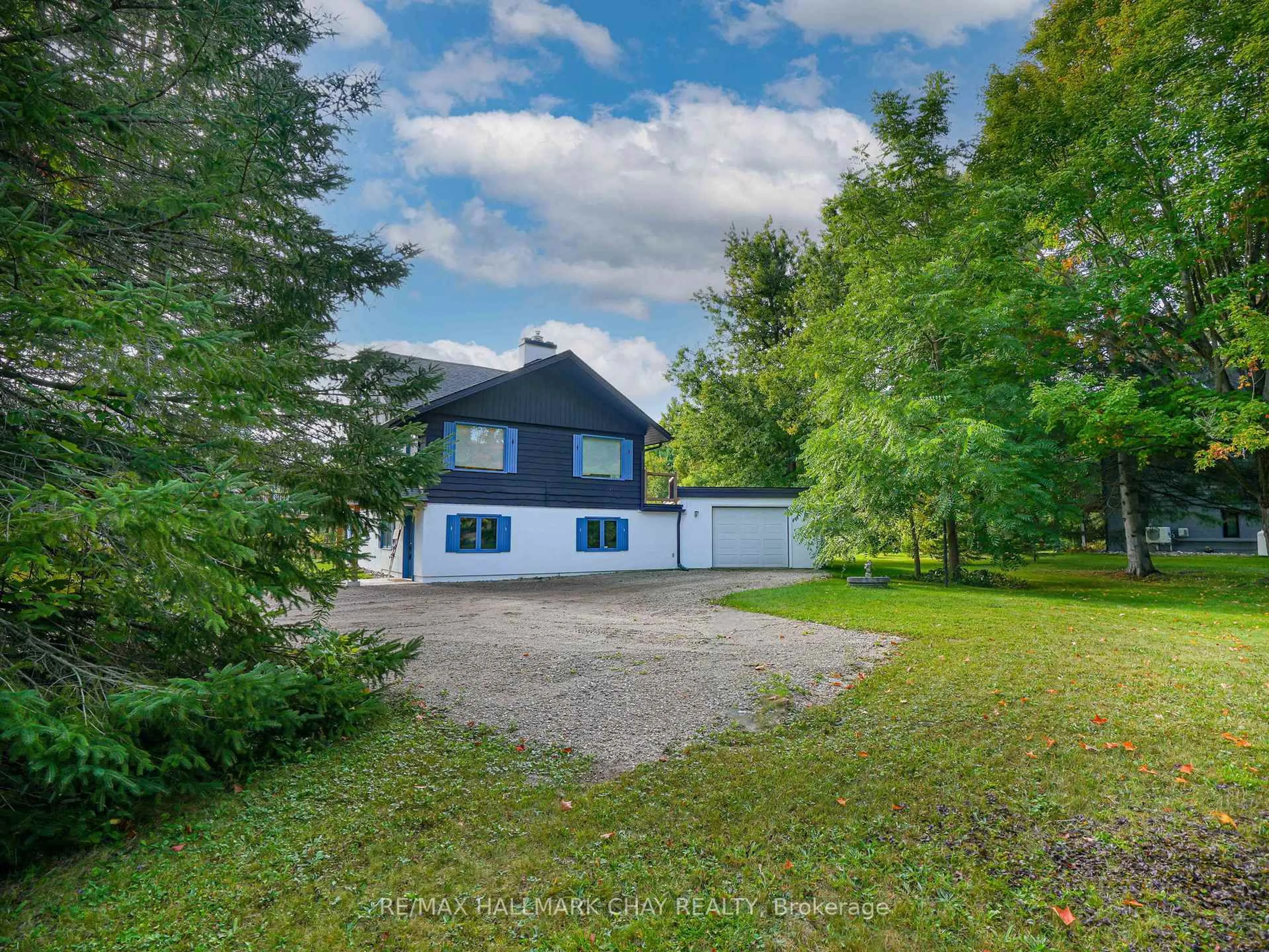 A pic from outside/outdoor area/front of a property/back of a property/a pic from drone, unknown for 61 Pine River Cres, Mulmur Ontario L9V 3H3