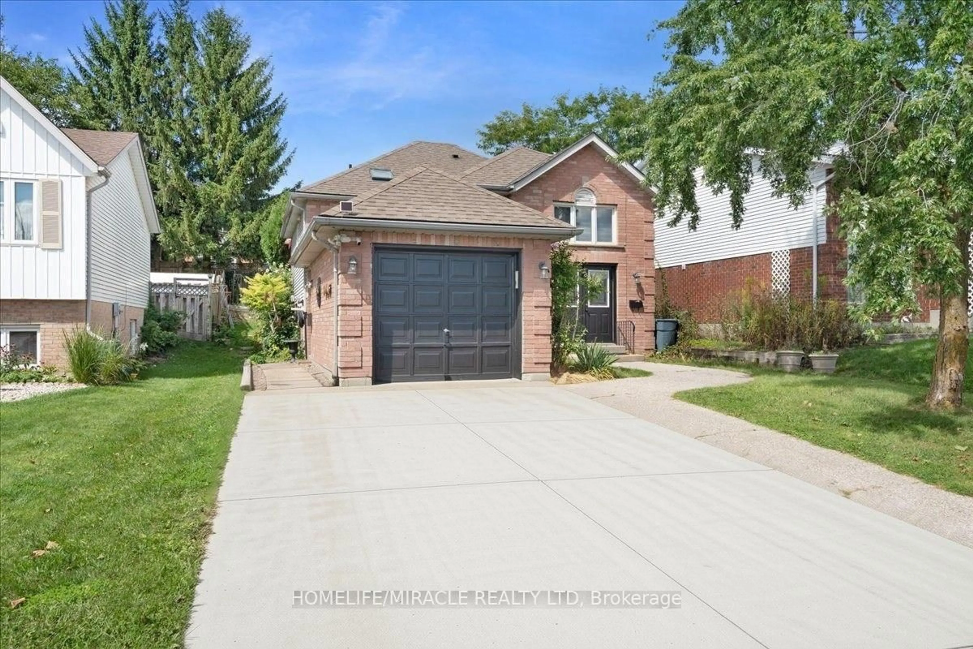 Home with brick exterior material, street for 150 Bankside Dr, Kitchener Ontario N2N 3E4