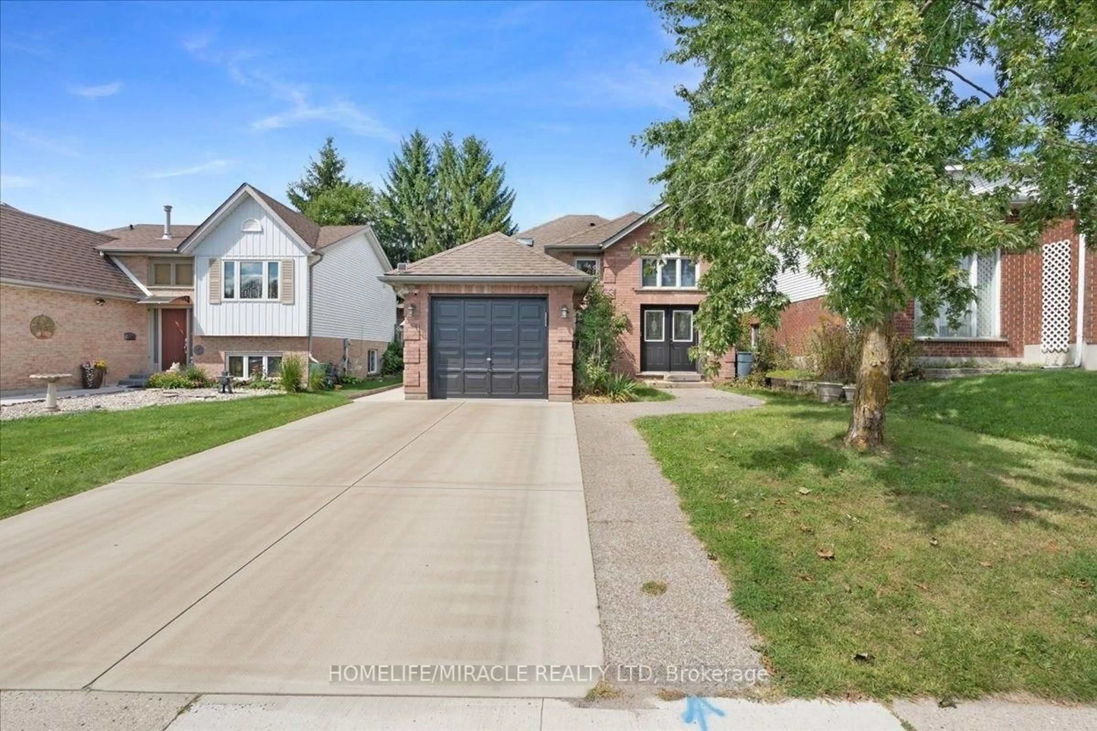Home with brick exterior material, street for 150 Bankside Dr, Kitchener Ontario N2N 3E4