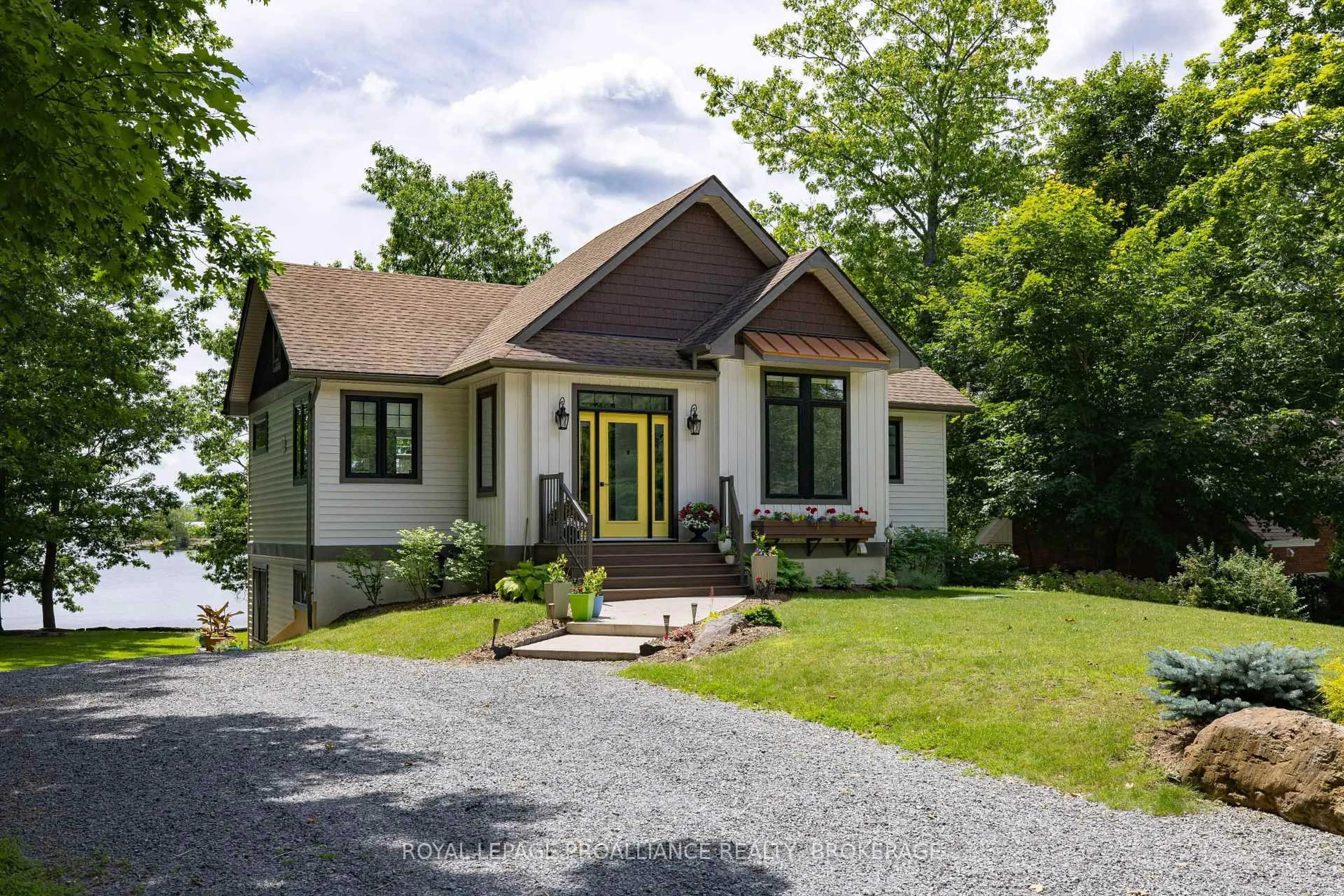 Home with brick exterior material, street for 3842 Hideaway Lane, Battersea Ontario K0H 1H0