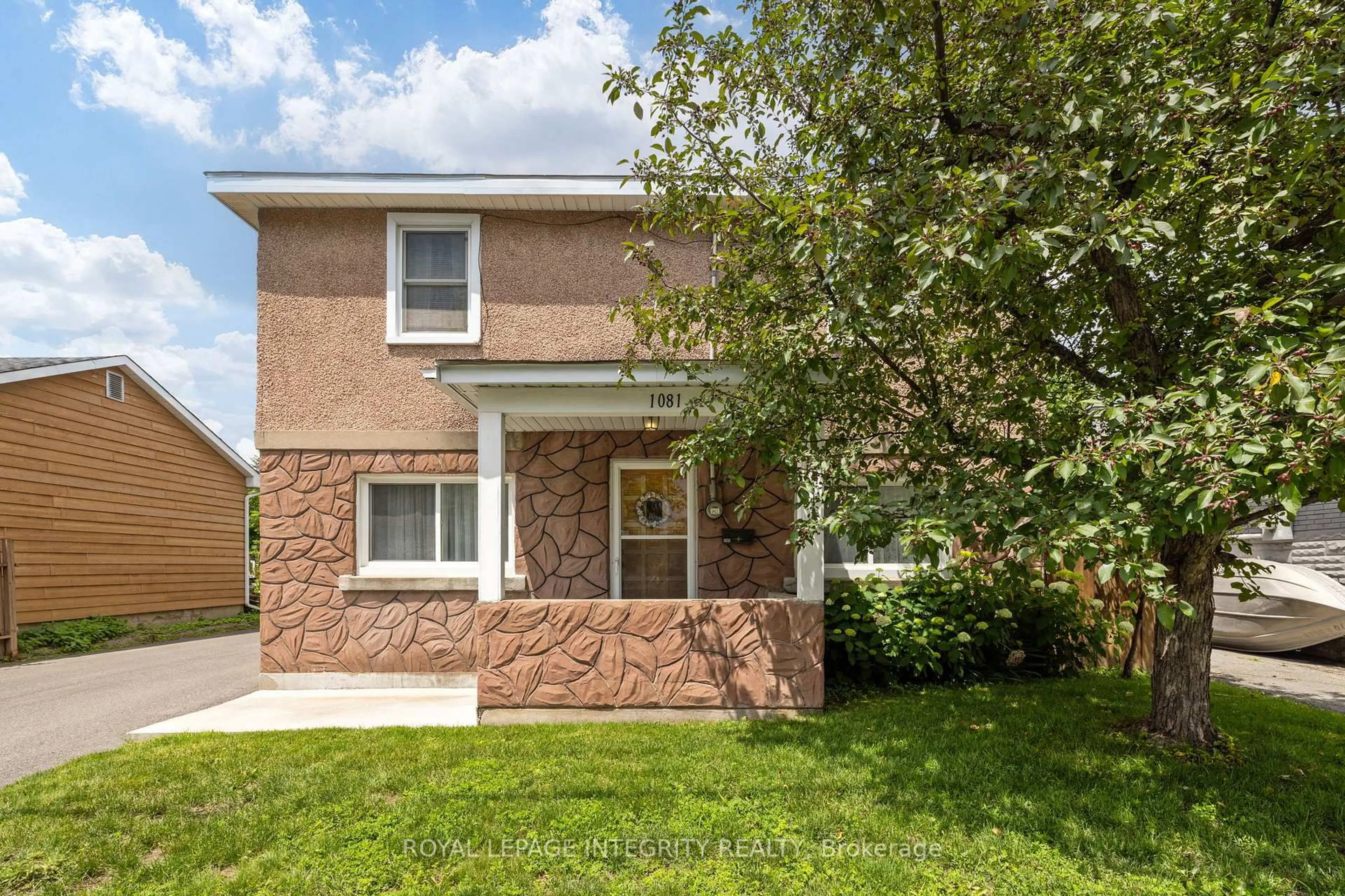 Home with brick exterior material, street for 1081 Kenaston St, Ottawa Ontario K1B 3P8