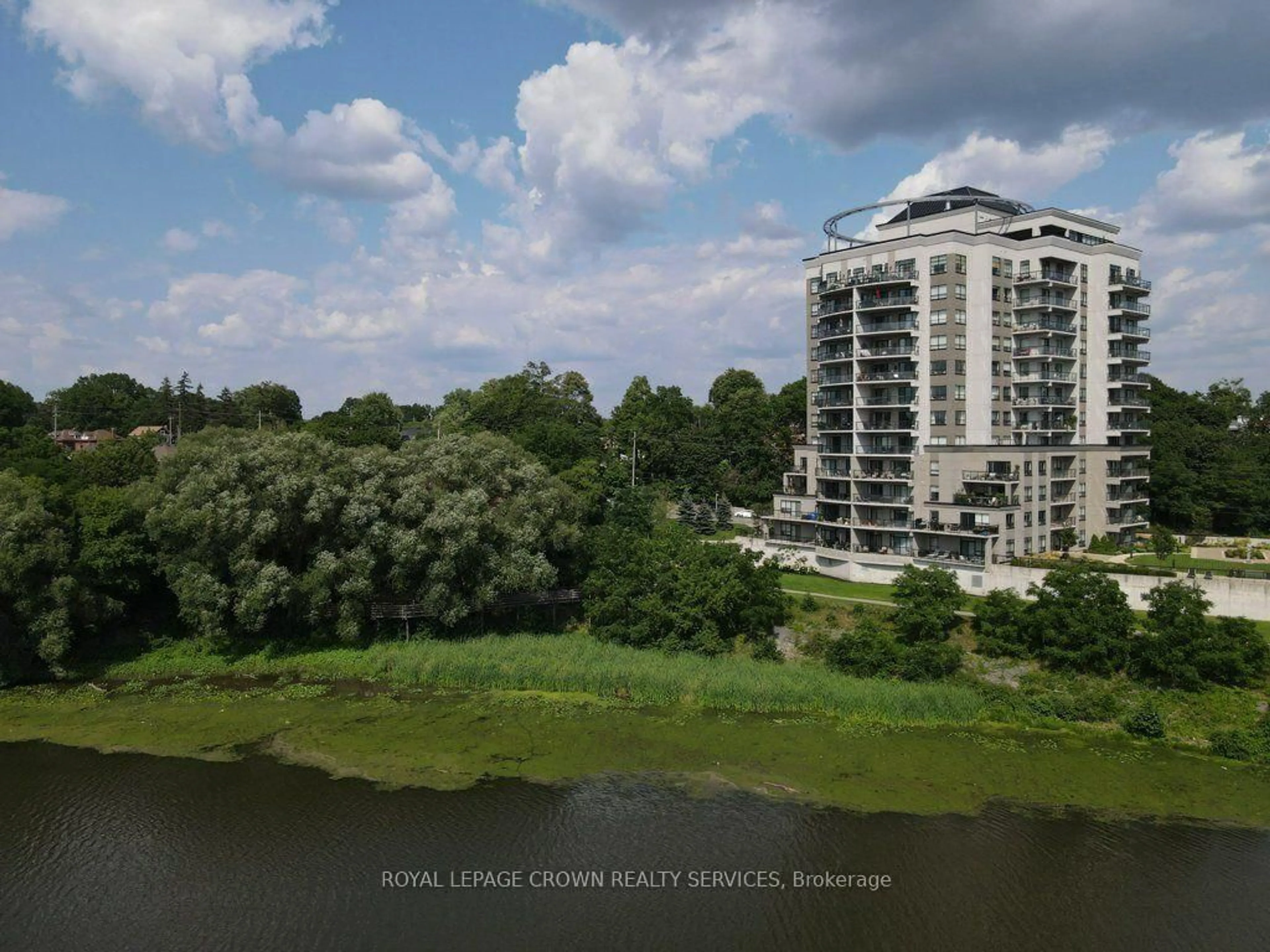 A pic from outside/outdoor area/front of a property/back of a property/a pic from drone, water/lake/river/ocean view for 170 Water St #804, Cambridge Ontario N1R 3B6