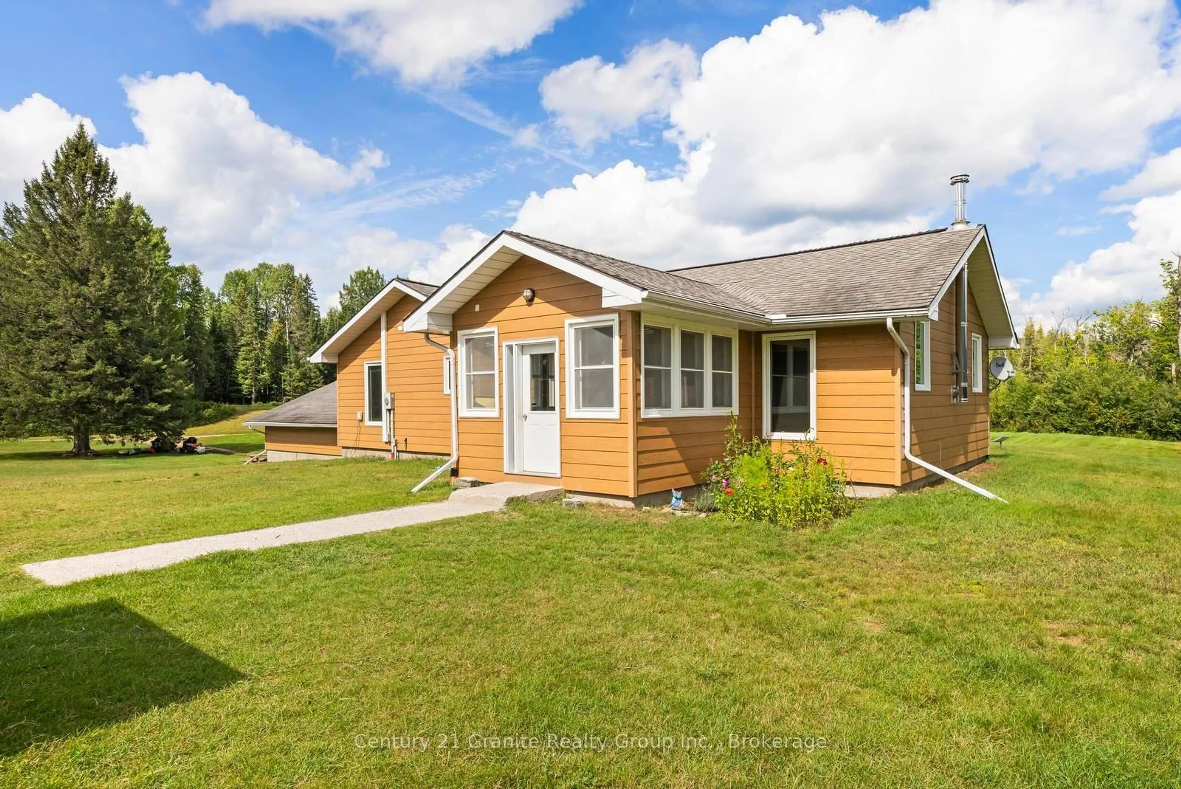 Home with vinyl exterior material, street for 573 Browns Rd, Boulter Ontario K0L 1G0