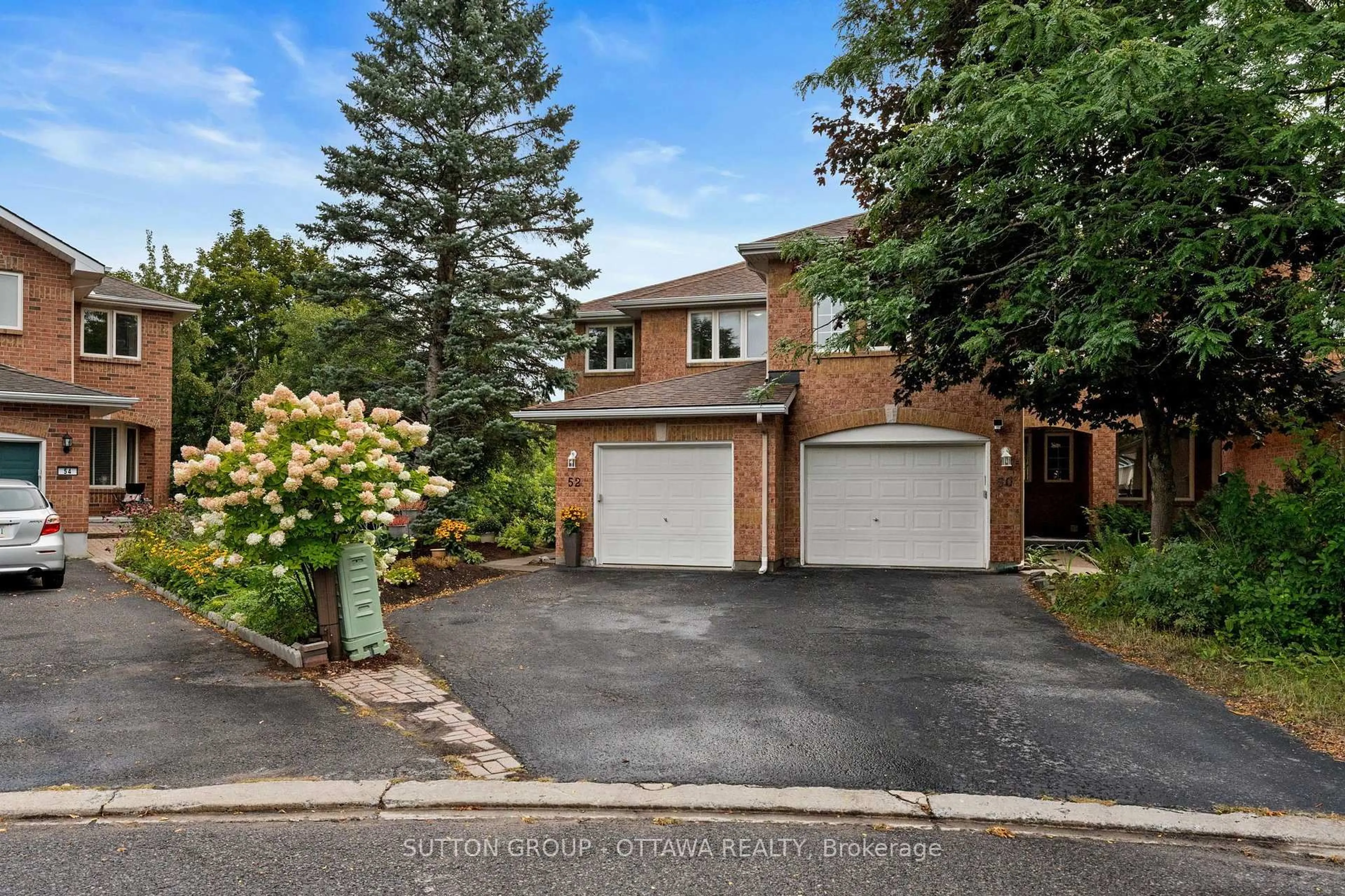Home with brick exterior material, street for 52 Windcrest Crt, Ottawa Ontario K2T 1B5
