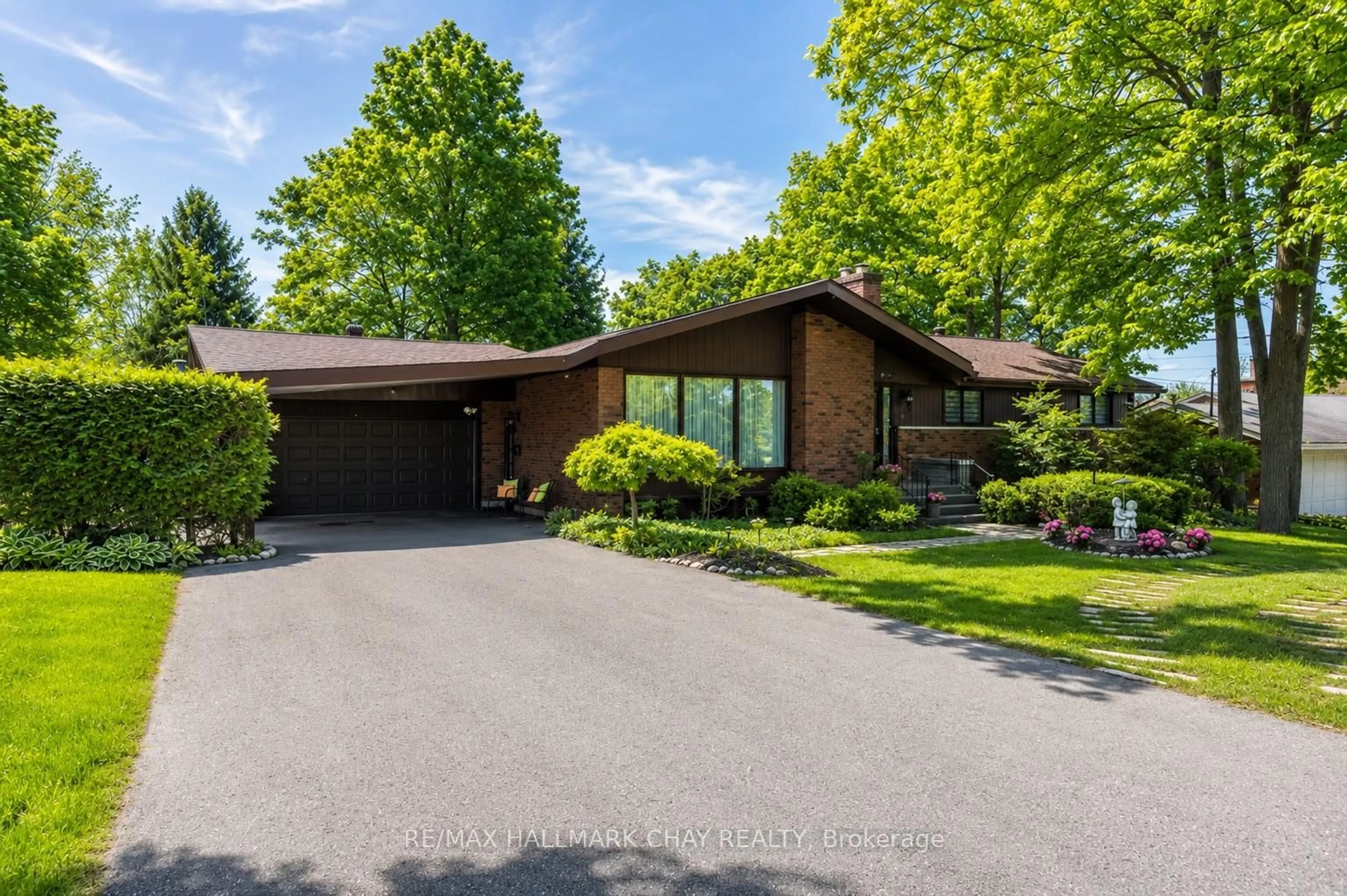 Home with brick exterior material, street for 1009 FAIRBAIRN St, Peterborough Ontario K9K 1C1