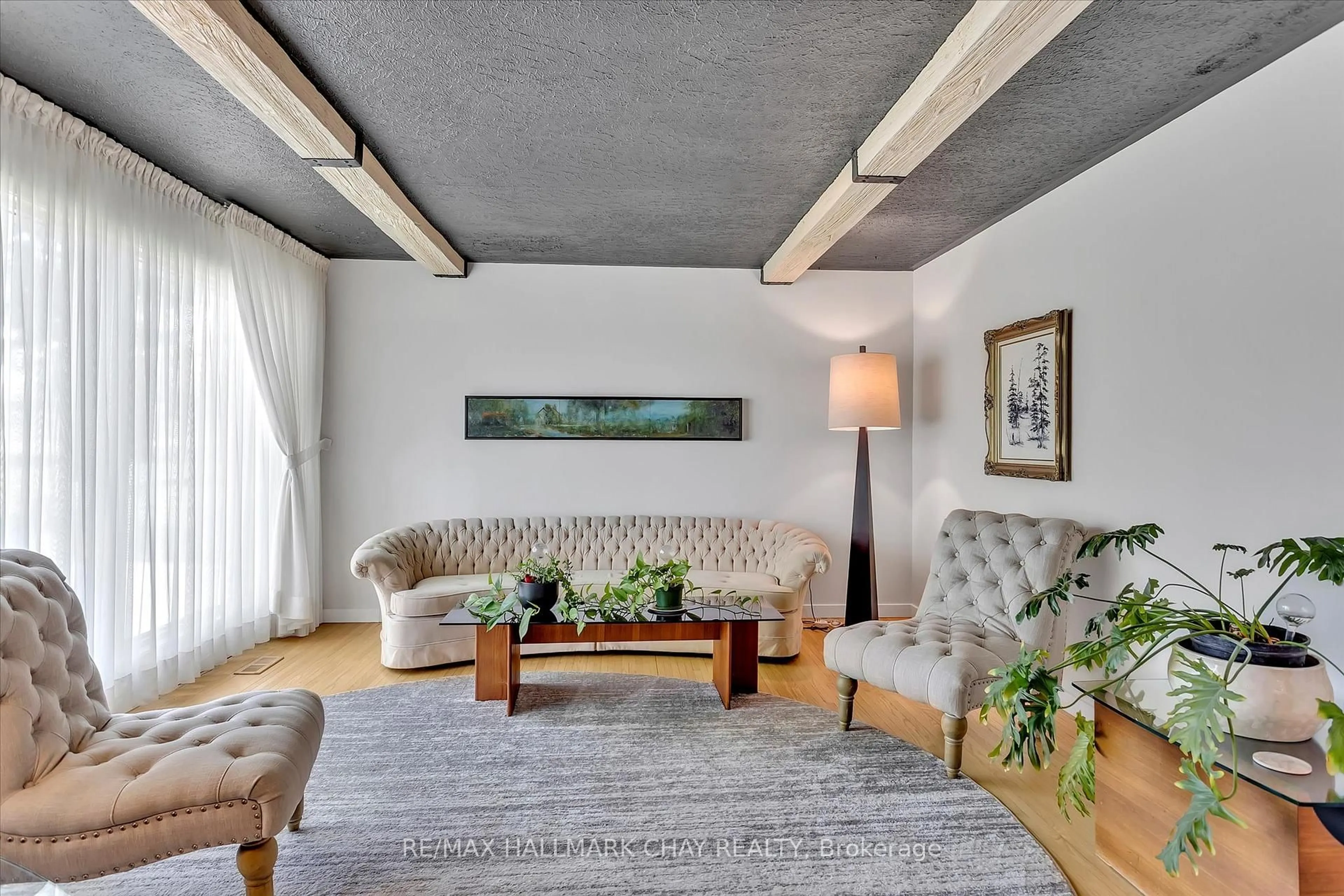 Living room with furniture, cement floor for 1009 FAIRBAIRN St, Peterborough Ontario K9K 1C1