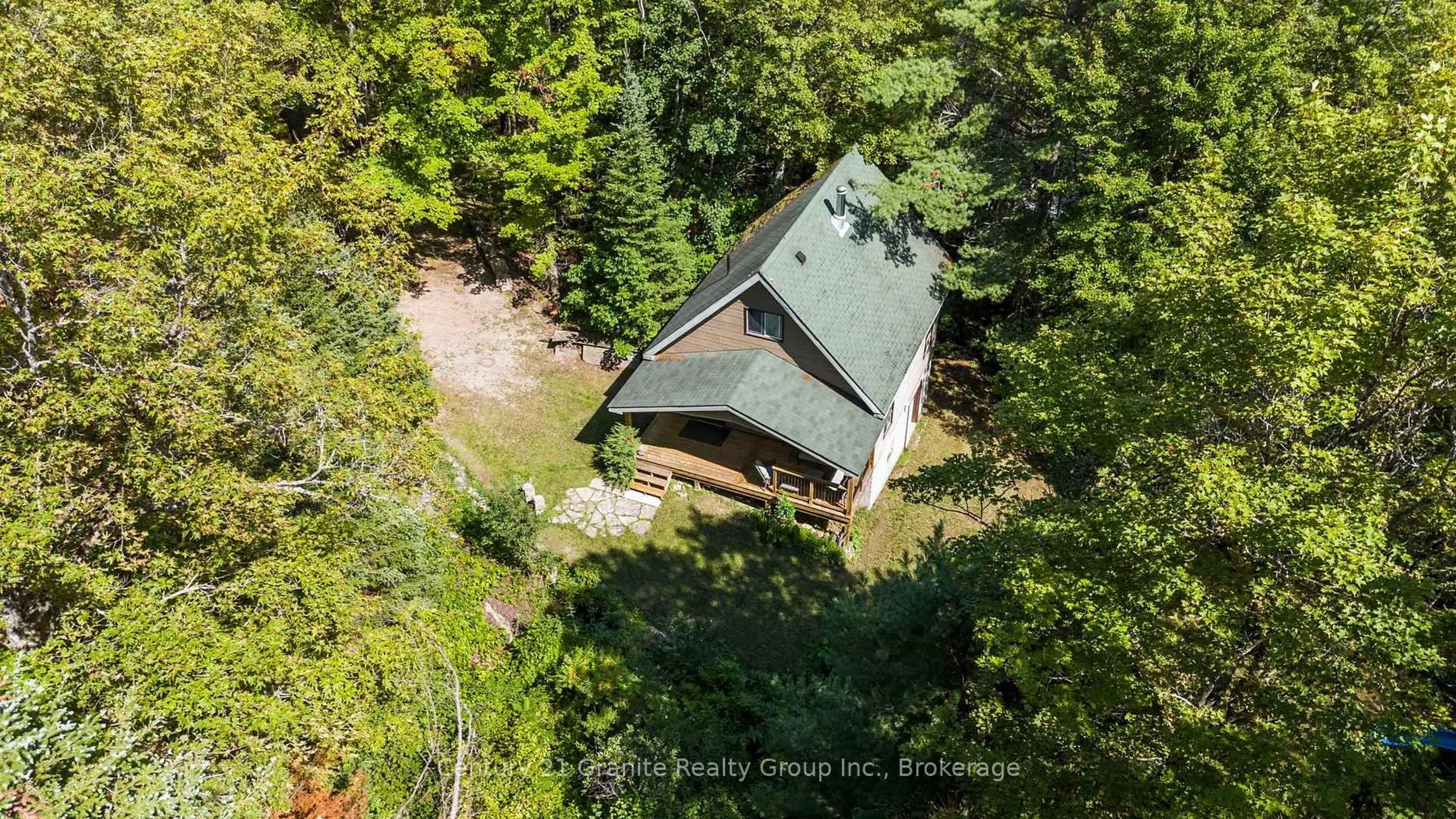 A pic from outside/outdoor area/front of a property/back of a property/a pic from drone, forest/trees view for 1140 Ashmont Lane, Dysart et al Ontario K0M 1S0
