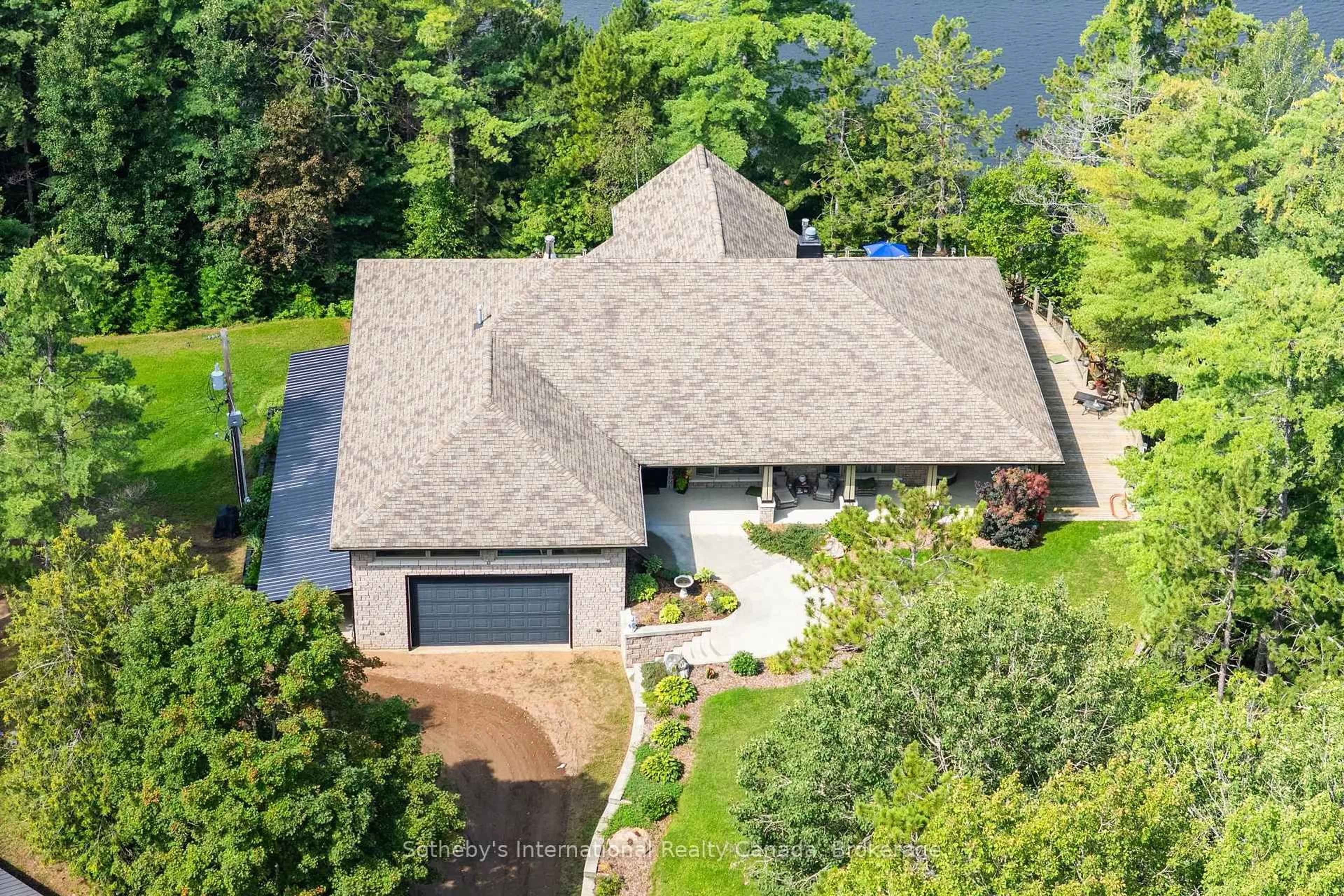 A pic from outside/outdoor area/front of a property/back of a property/a pic from drone, water/lake/river/ocean view for 362 Cameron Lake Rd, Palmer Rapids Ontario K0J 2E0