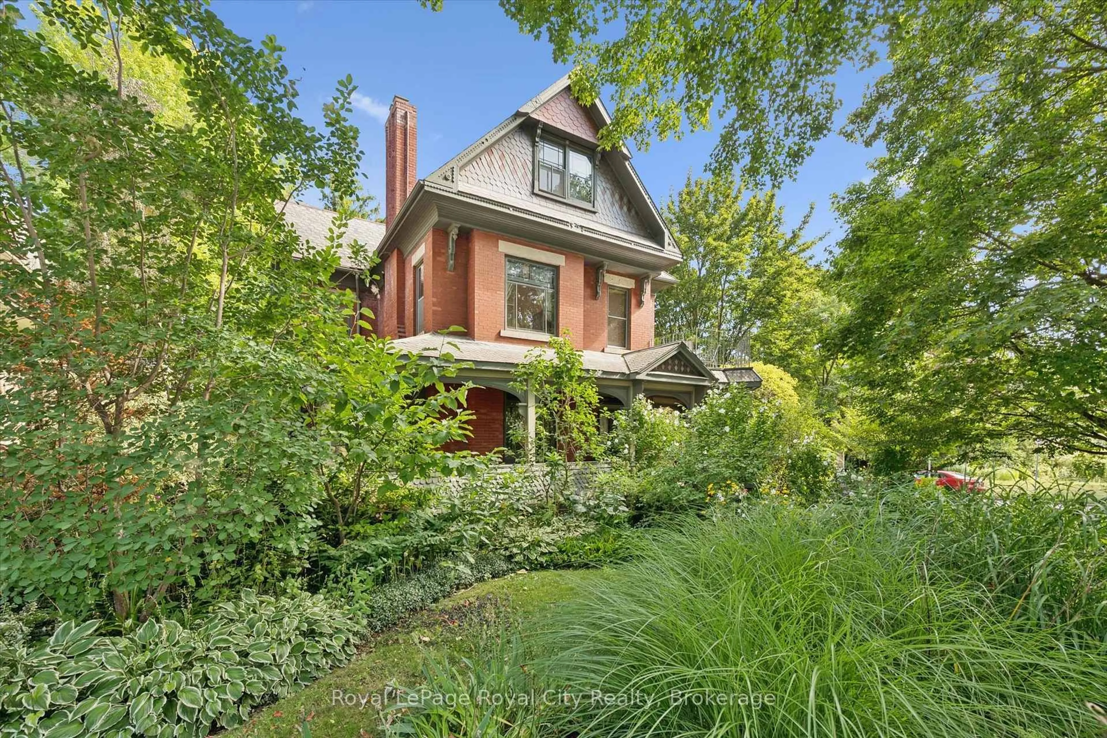 Home with brick exterior material, street for 80 London Rd, Guelph Ontario N1H 2B7