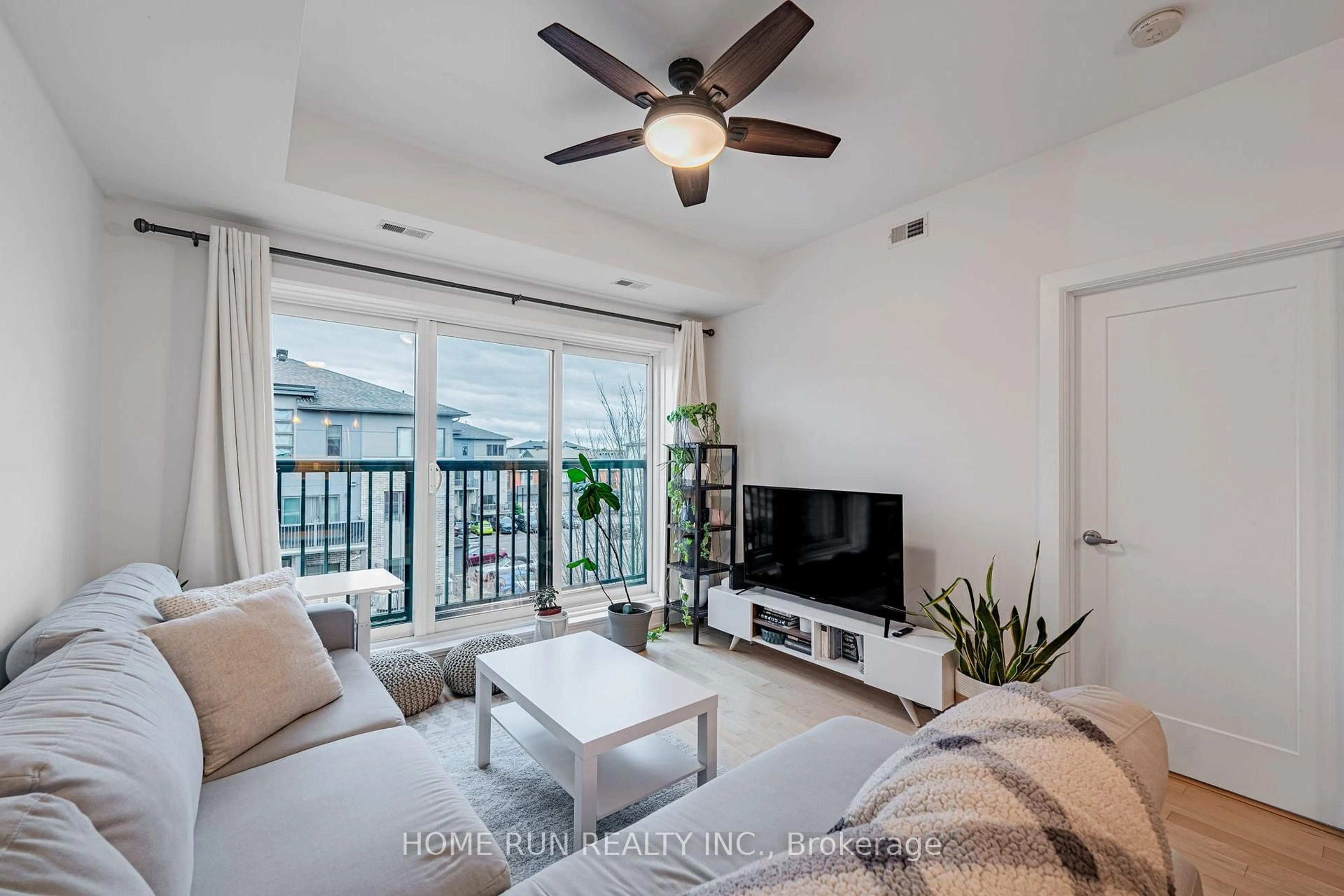Living room with furniture, unknown for 615 Longfields Dr #312, Ottawa Ontario K2J 6J3