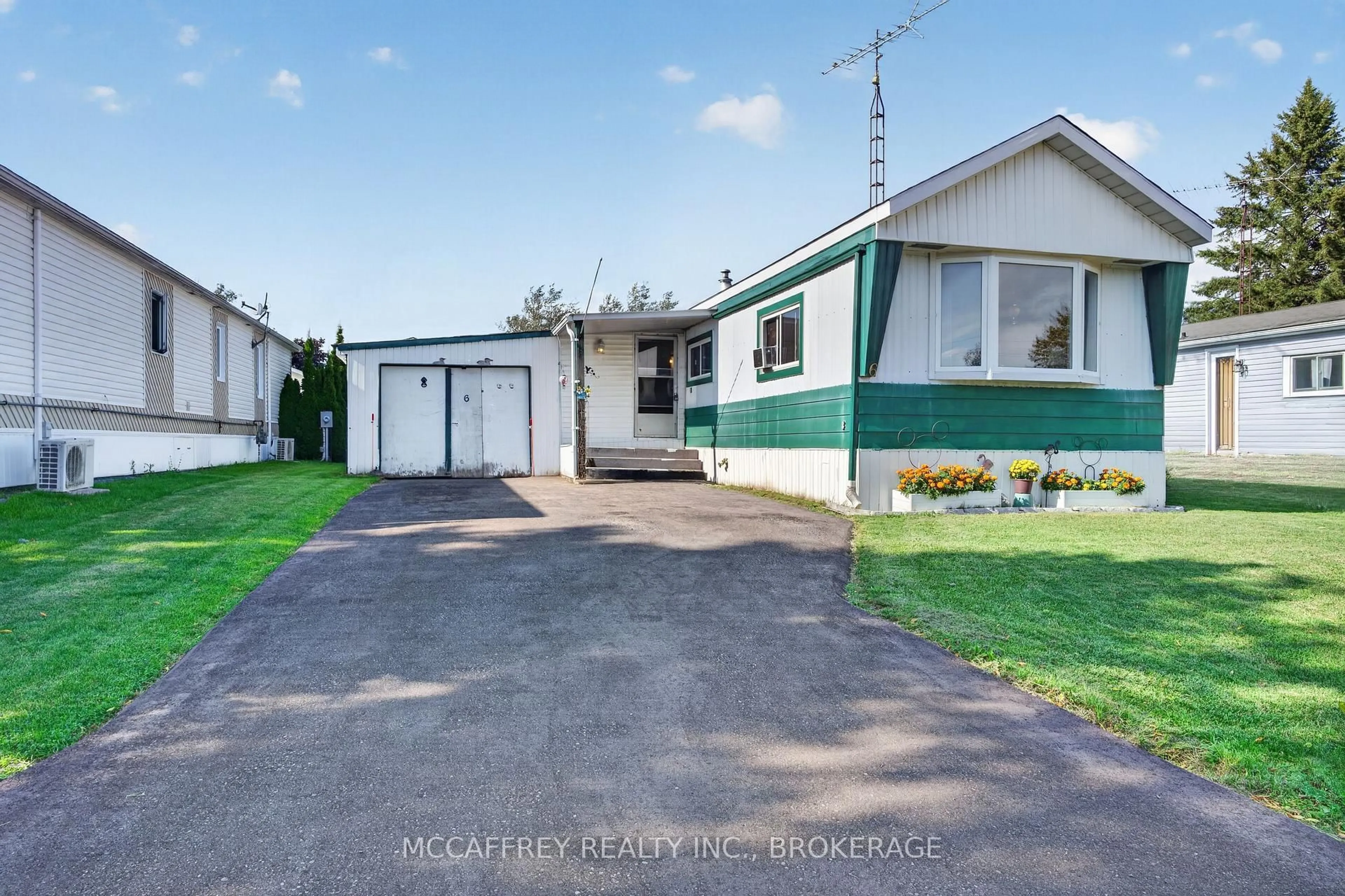 A pic from outside/outdoor area/front of a property/back of a property/a pic from drone, street for 6 Cedar St, Greater Napanee Ontario K7R 3L1