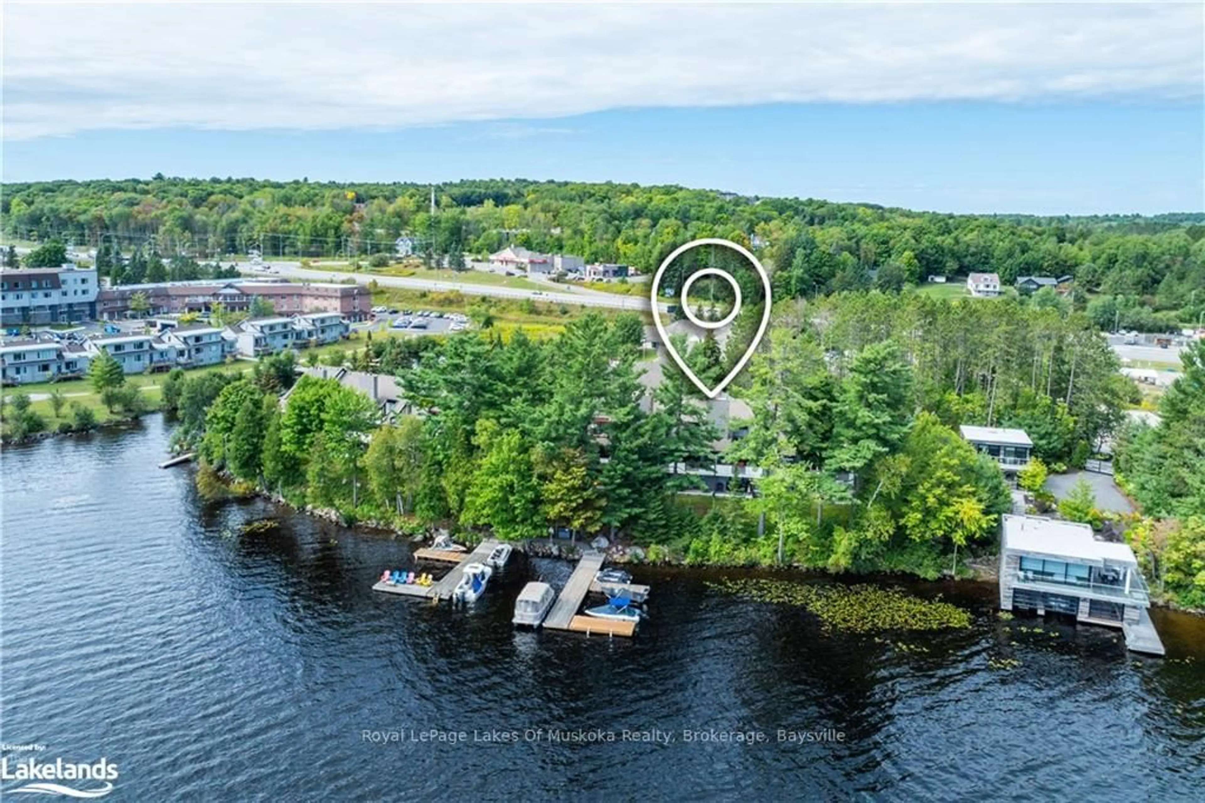 A pic from outside/outdoor area/front of a property/back of a property/a pic from drone, water/lake/river/ocean view for 10 COVESIDE Dr #106, Huntsville Ontario P1H 1C3