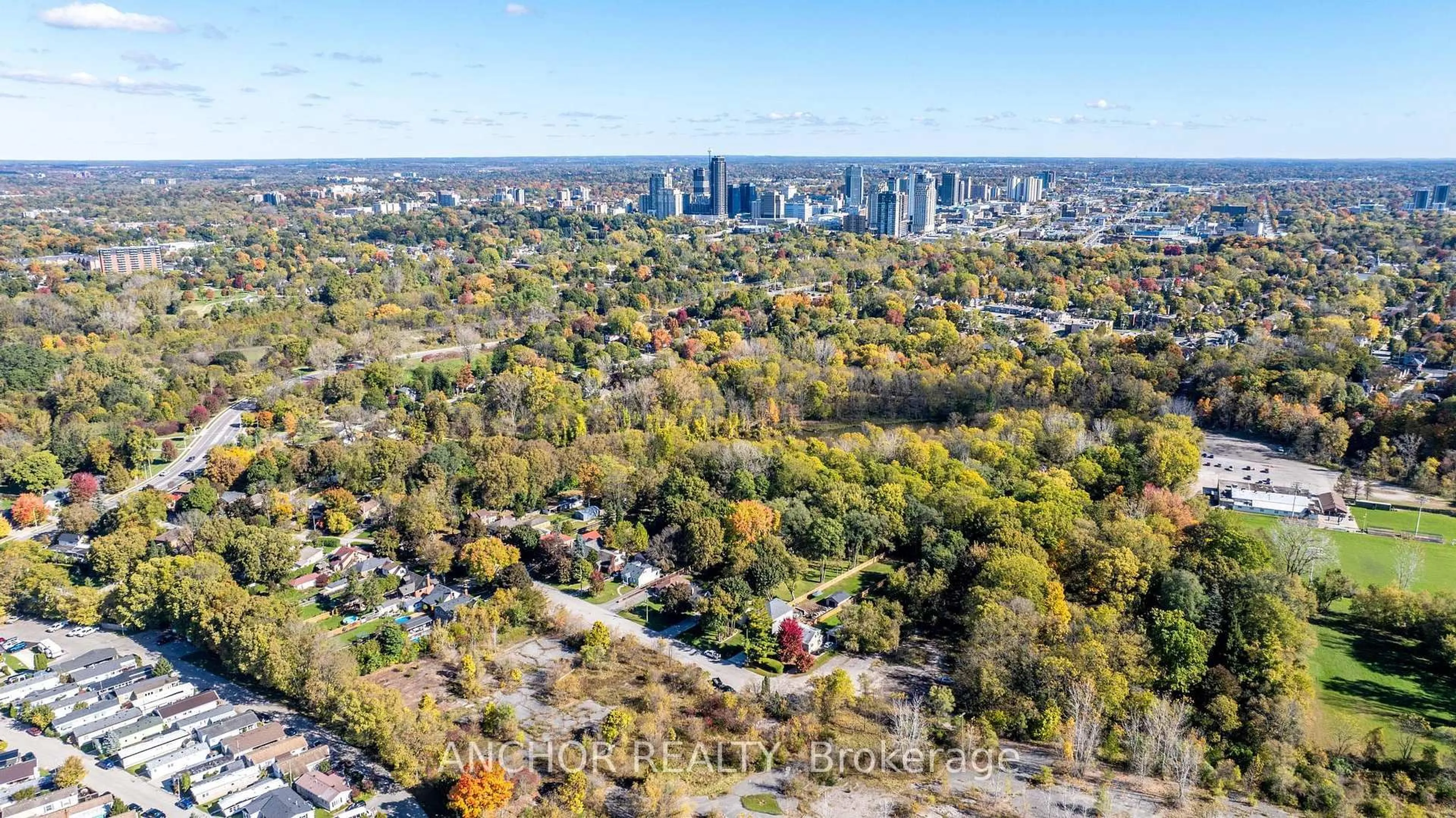 A pic from outside/outdoor area/front of a property/back of a property/a pic from drone, city buildings view from balcony for 65 Cove Rd, London South Ontario N6J 1H8