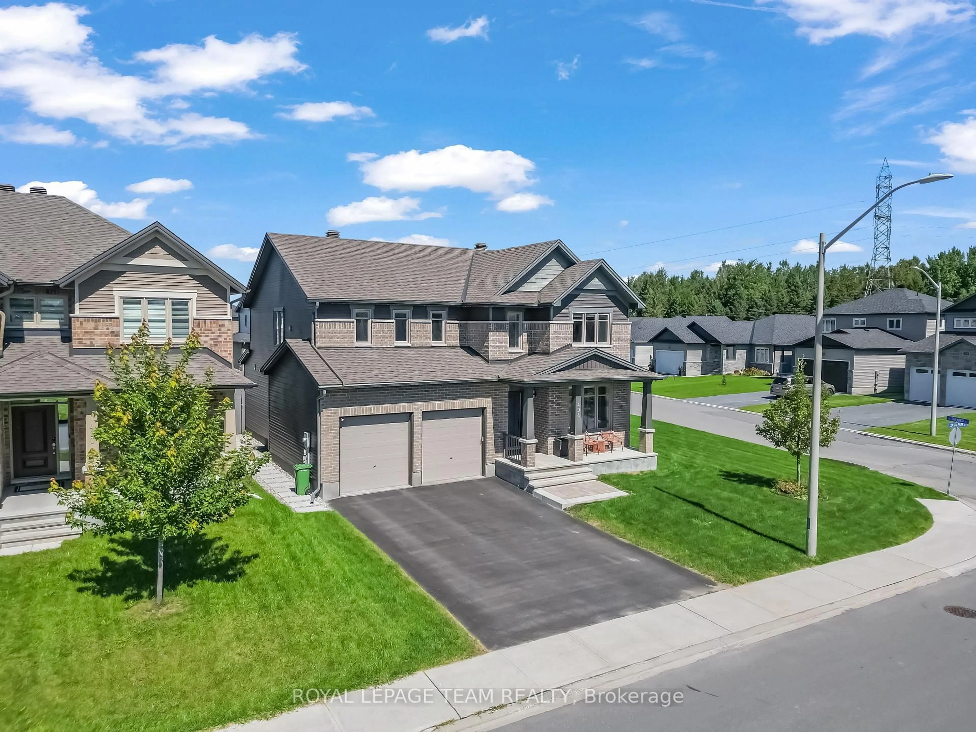 A pic from outside/outdoor area/front of a property/back of a property/a pic from drone, street for 494 Central Park Blvd, Russell Ontario K4R 0C6