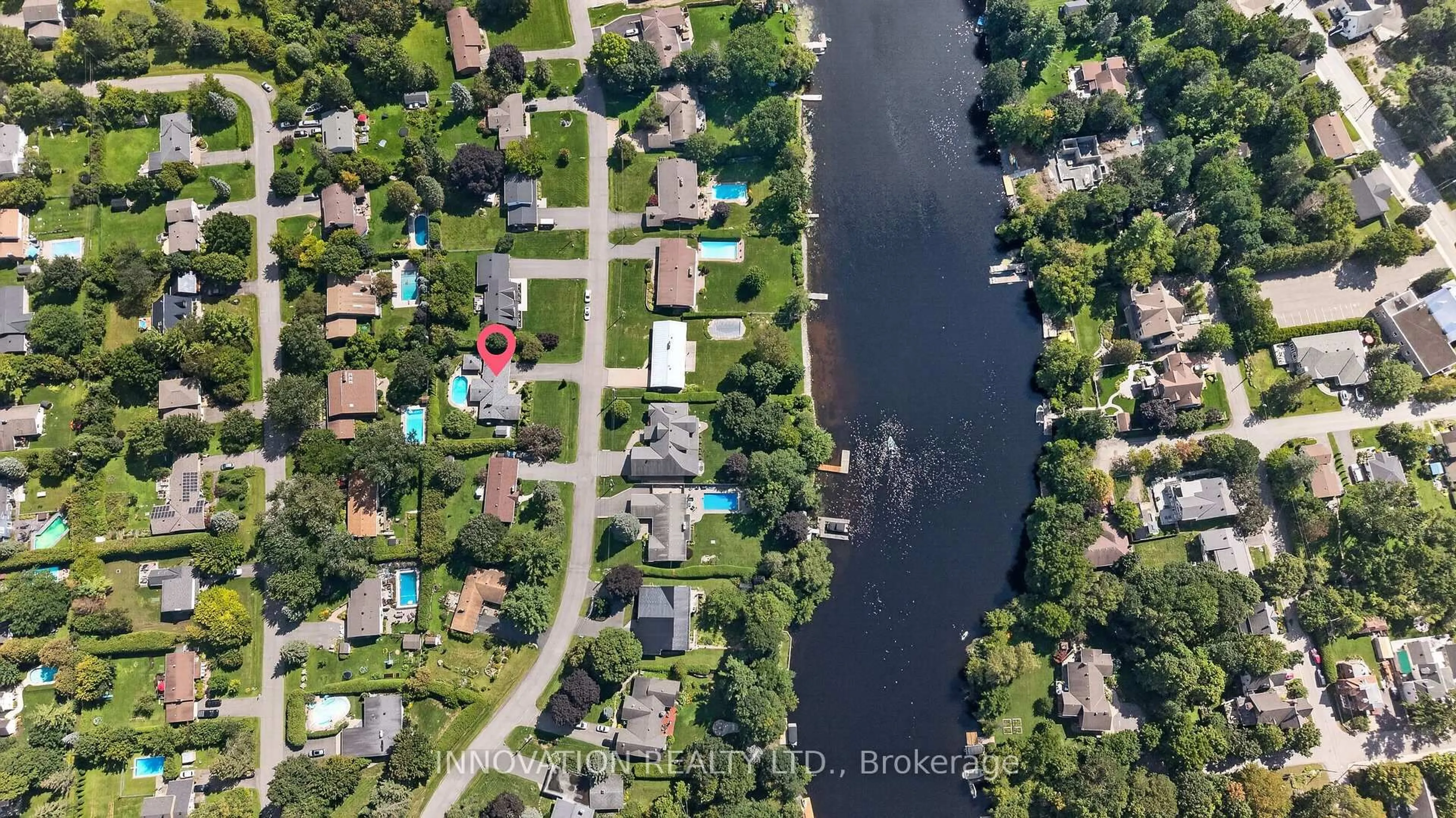 A pic from outside/outdoor area/front of a property/back of a property/a pic from drone, water/lake/river/ocean view for 5569 South River Dr, Manotick Ontario K4M 1J4