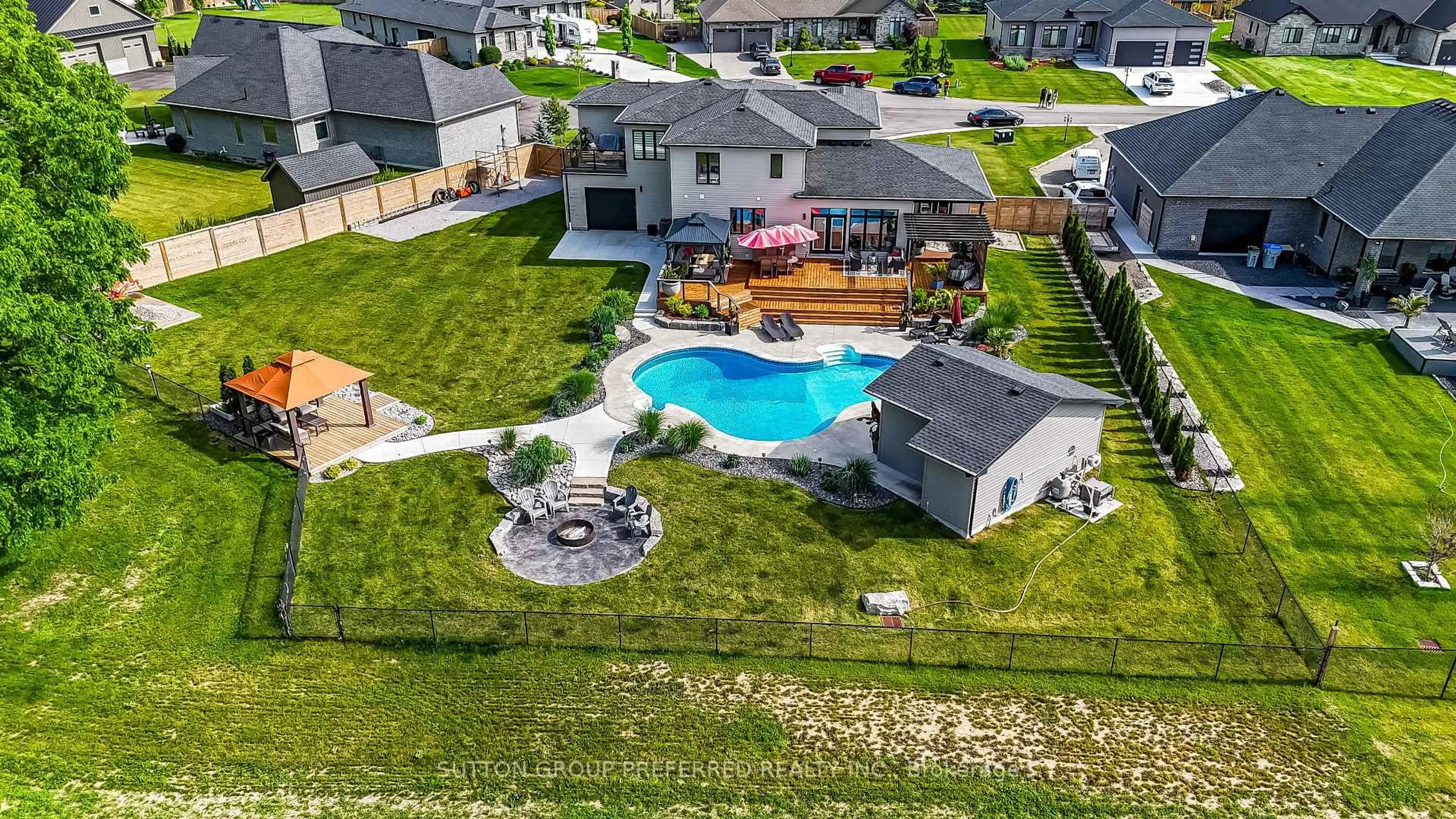 A pic from outside/outdoor area/front of a property/back of a property/a pic from drone, water/lake/river/ocean view for 12 Grogast Crt, Adelaide Metcalfe Ontario N7G 3H8