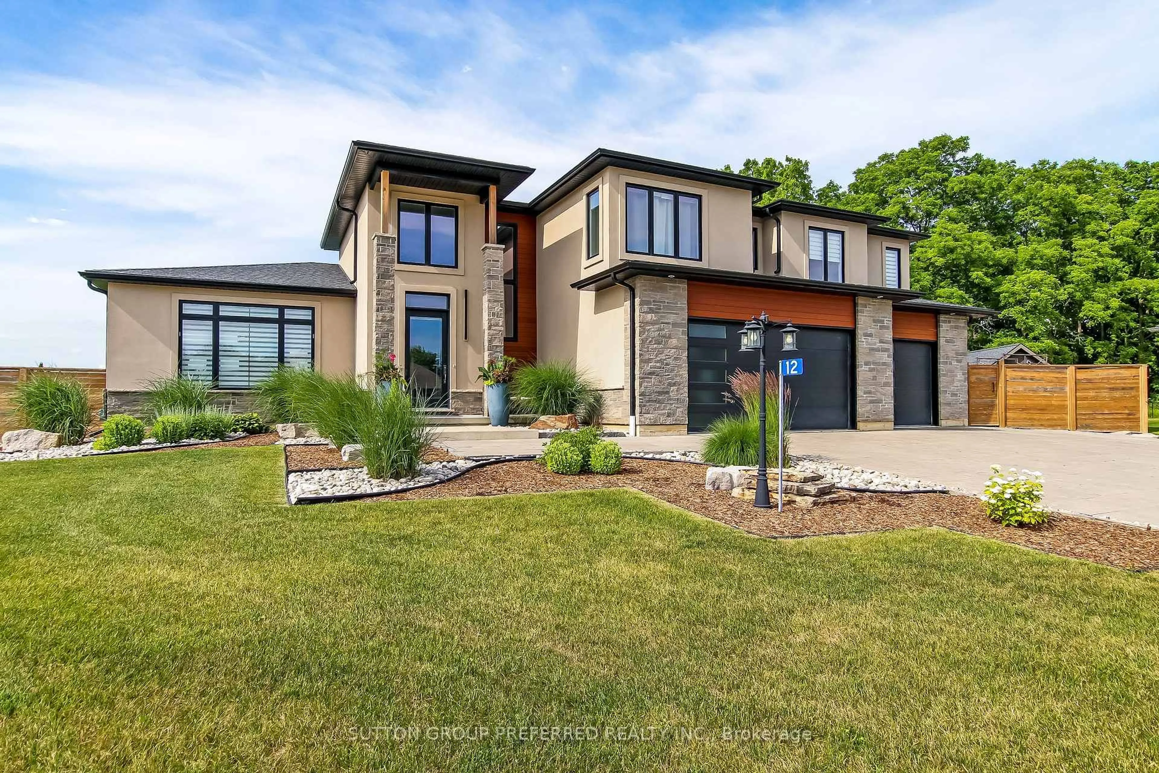 Home with brick exterior material, unknown for 12 Grogast Crt, Adelaide Metcalfe Ontario N7G 3H8
