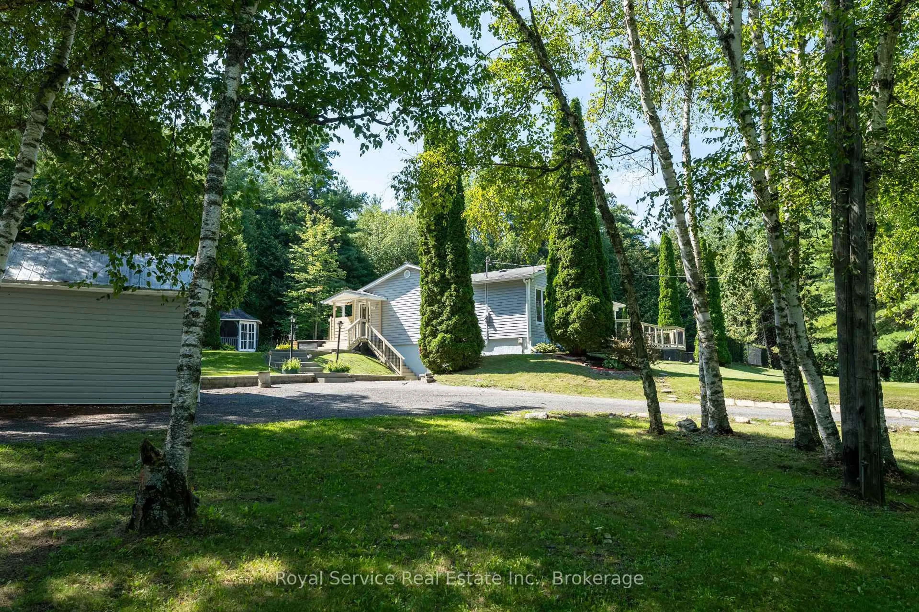 A pic from outside/outdoor area/front of a property/back of a property/a pic from drone, forest/trees view for 7251 Cavan Rd, Hamilton Township Ontario K0L 1E0