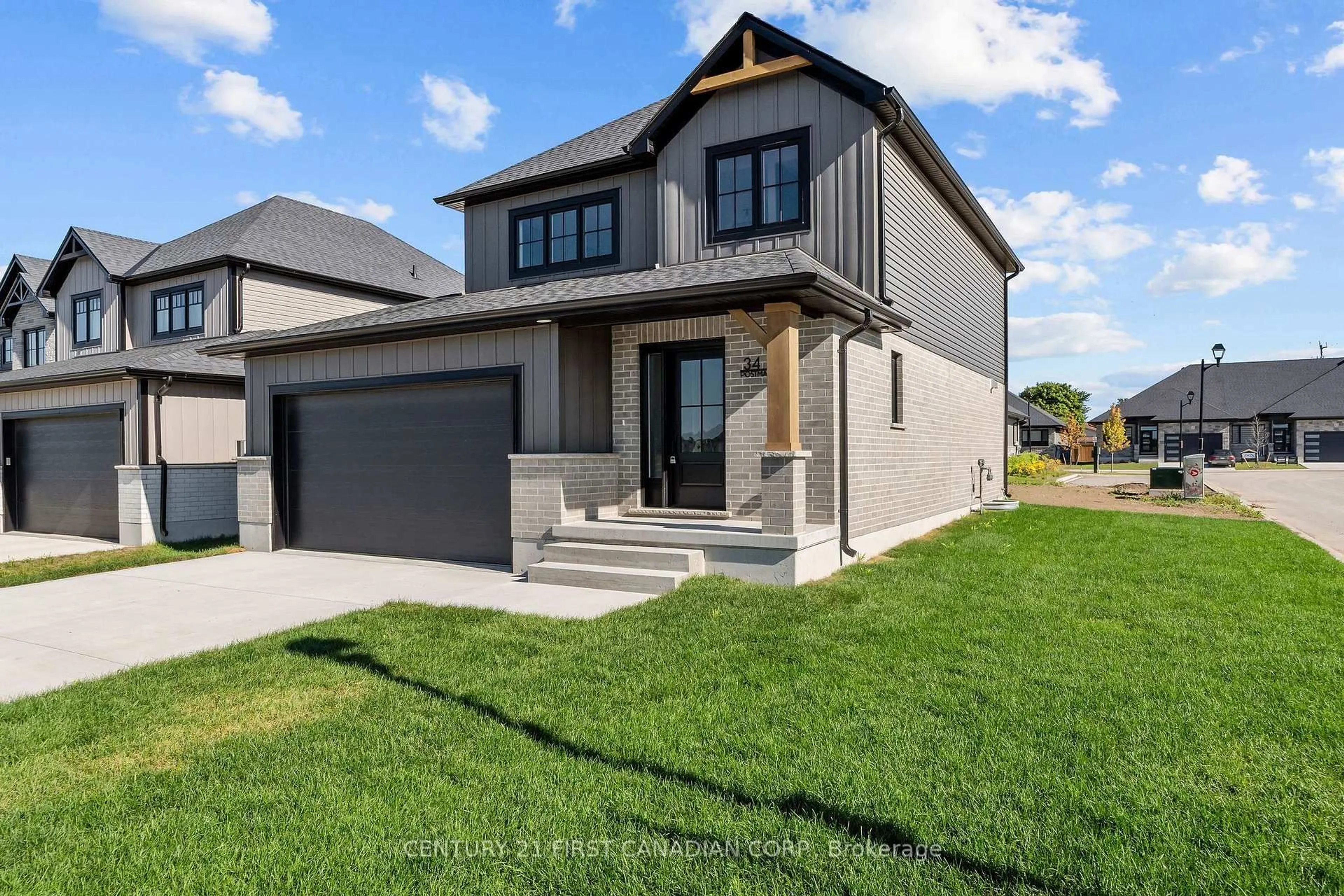 Home with brick exterior material, street for 34 Postma Cres, North Middlesex Ontario N0M 1A0