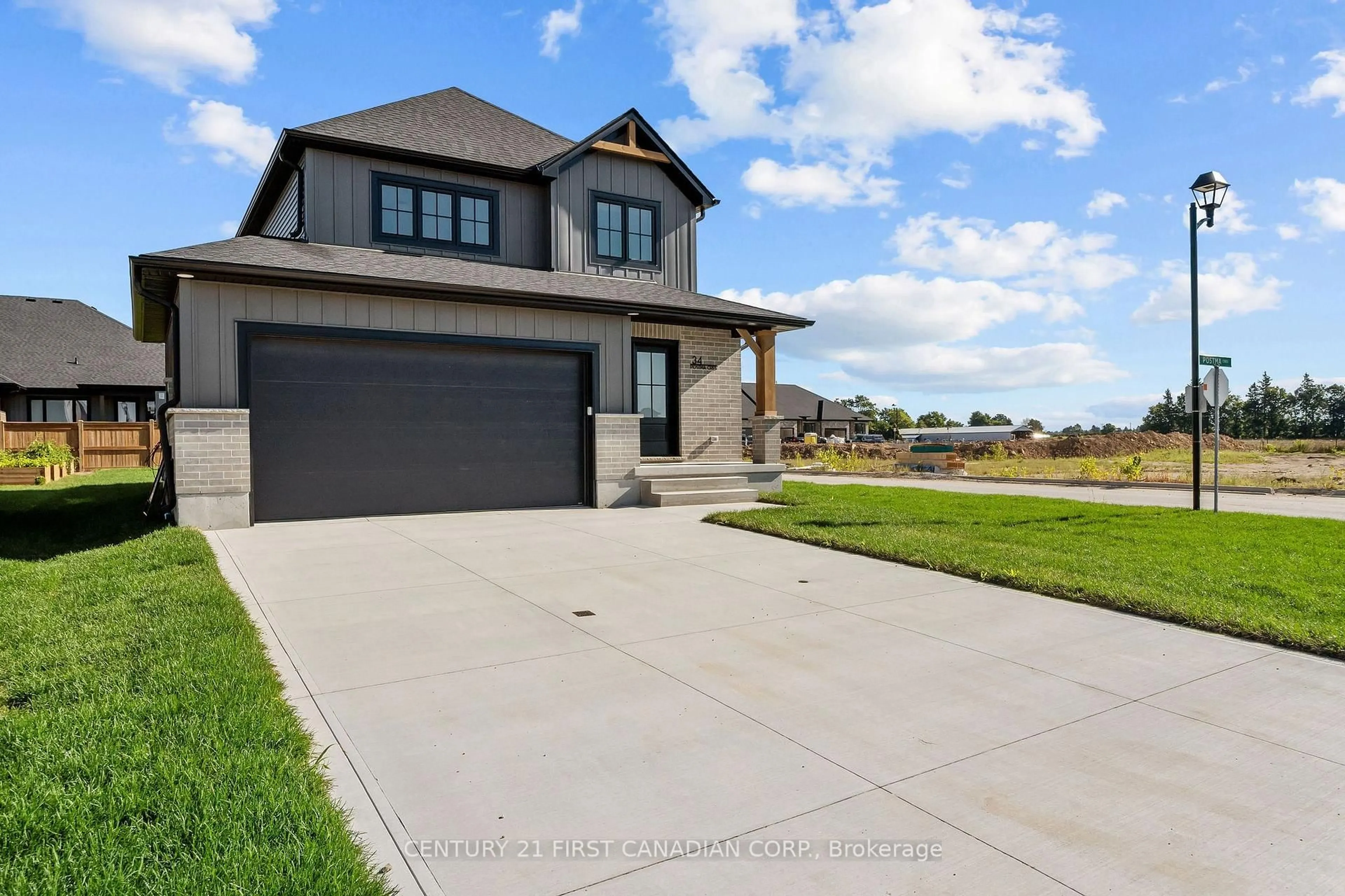 Home with brick exterior material, street for 34 Postma Cres, North Middlesex Ontario N0M 1A0