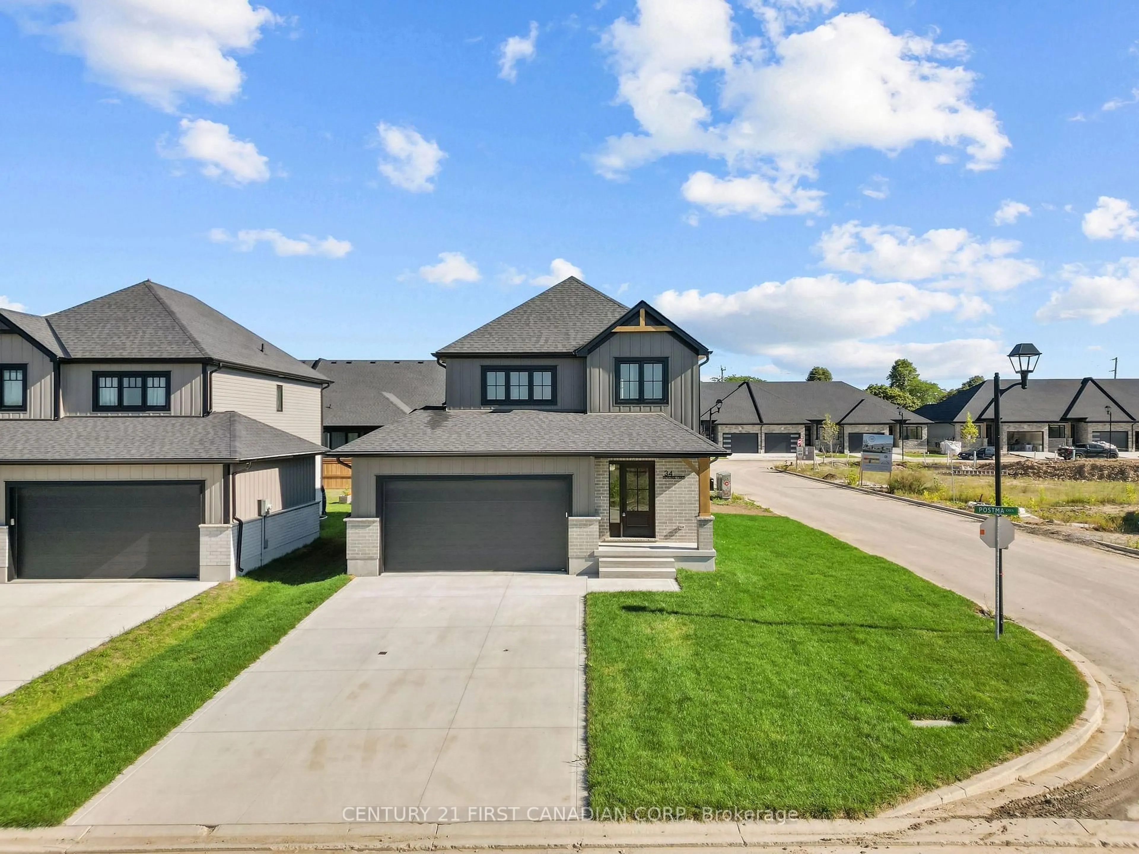 Home with brick exterior material, street for 34 Postma Cres, North Middlesex Ontario N0M 1A0