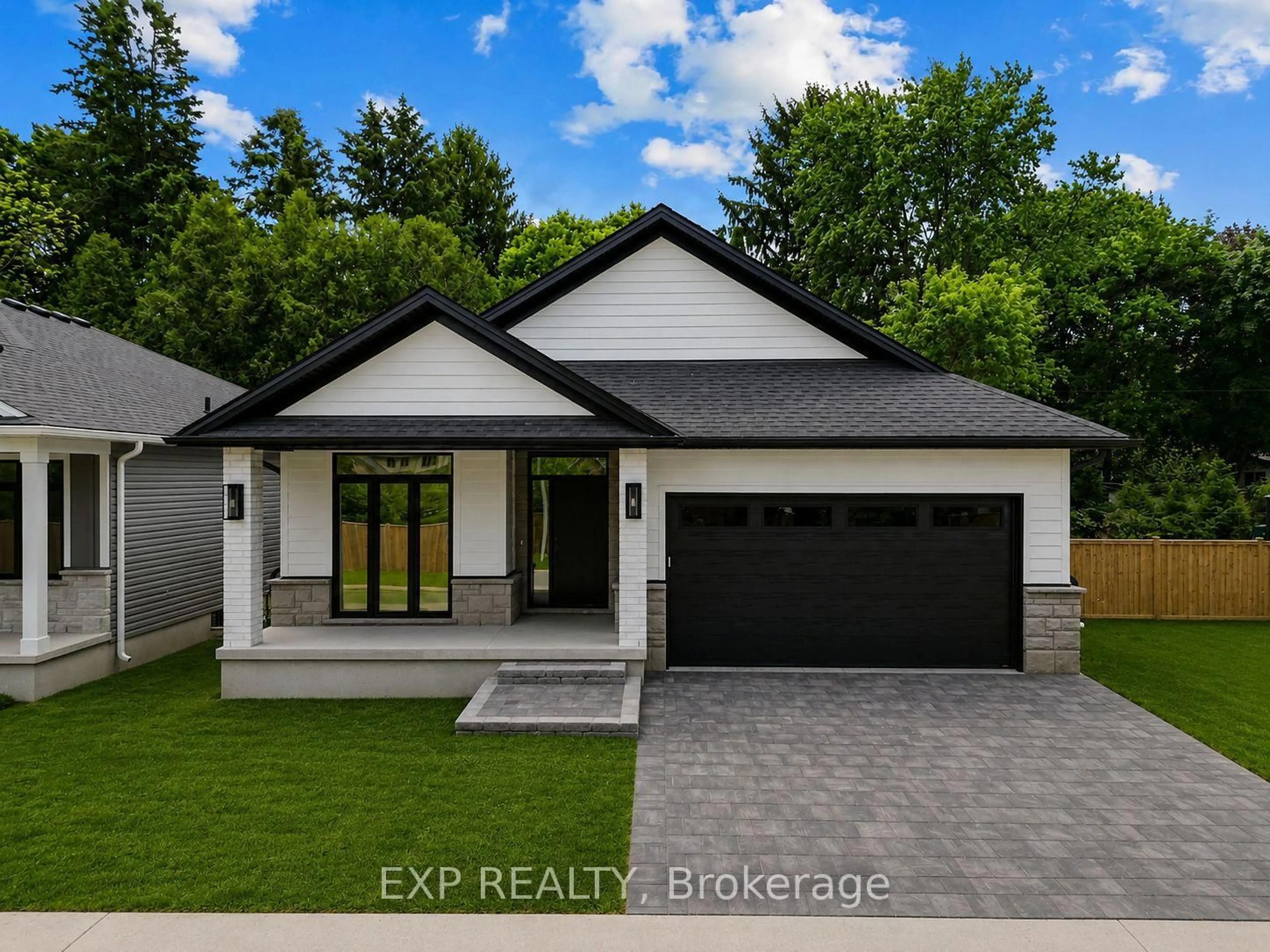 Home with vinyl exterior material, street for 430 Head St #22, Strathroy-Caradoc Ontario N7G 2K2