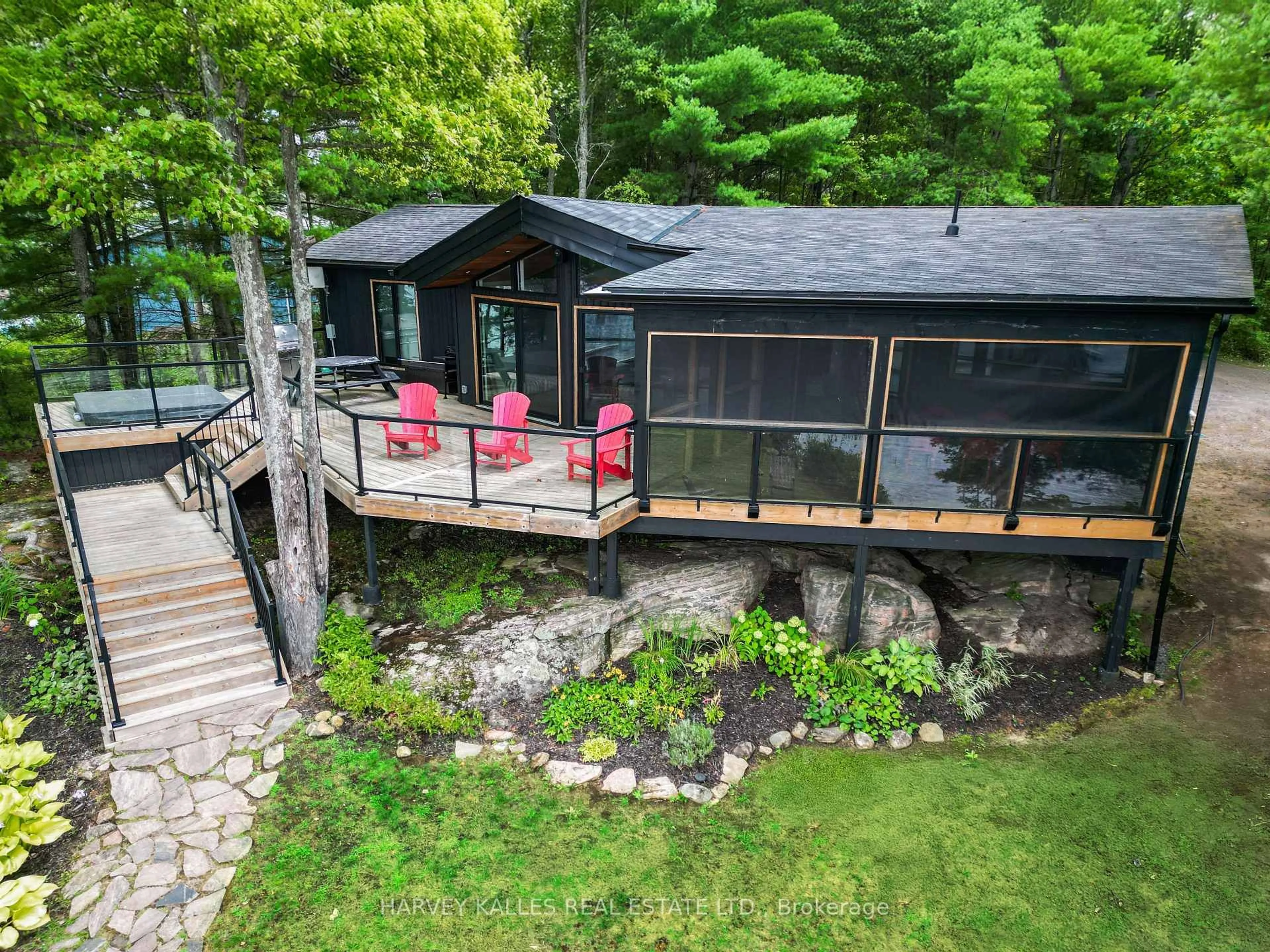 A pic from outside/outdoor area/front of a property/back of a property/a pic from drone, water/lake/river/ocean view for 1069 White Eagle Rd, Gravenhurst Ontario P0E 1G0