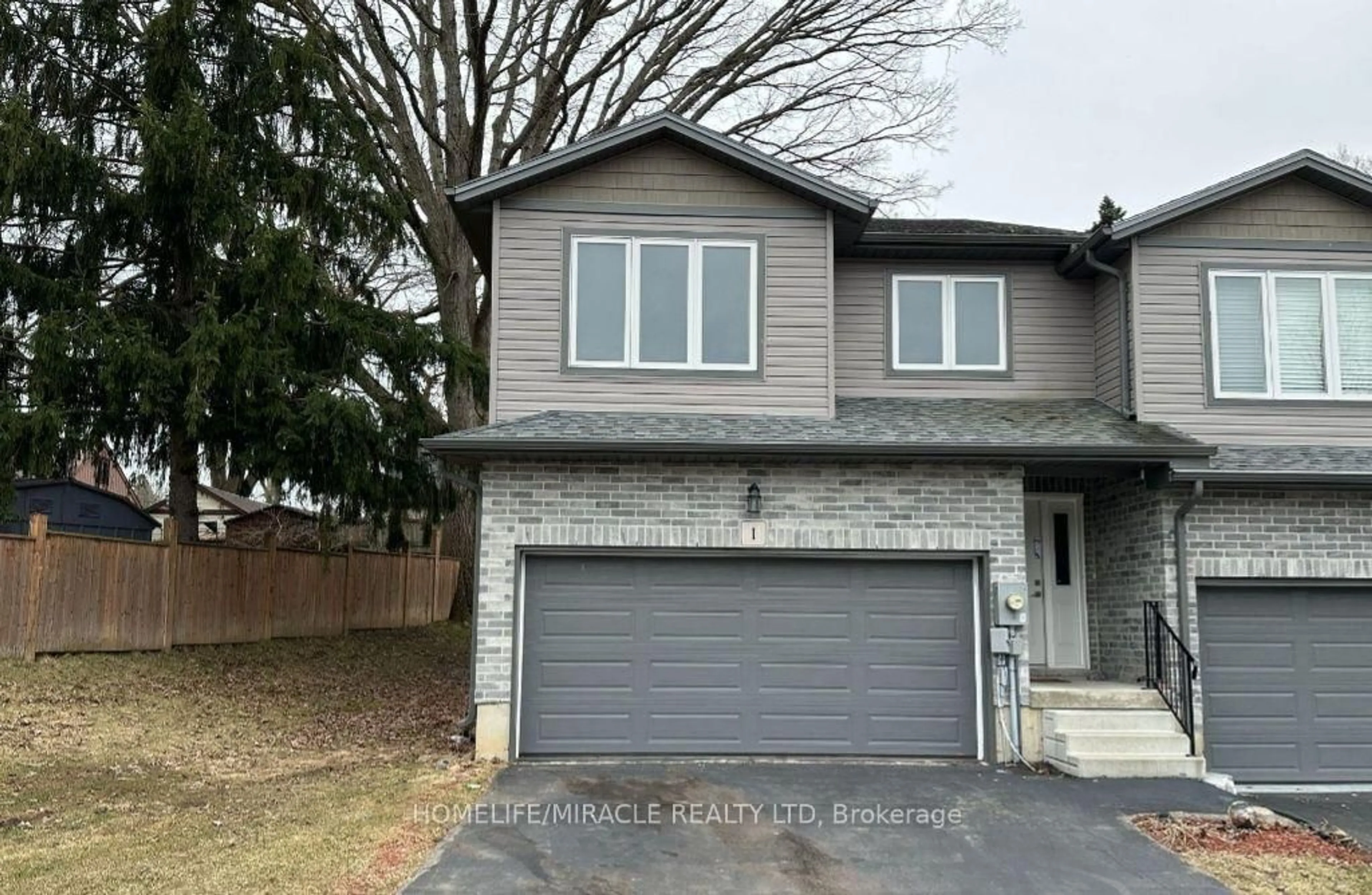 Home with brick exterior material, street for 61 Vienna Rd #1, Tillsonburg Ontario N4G 0J6