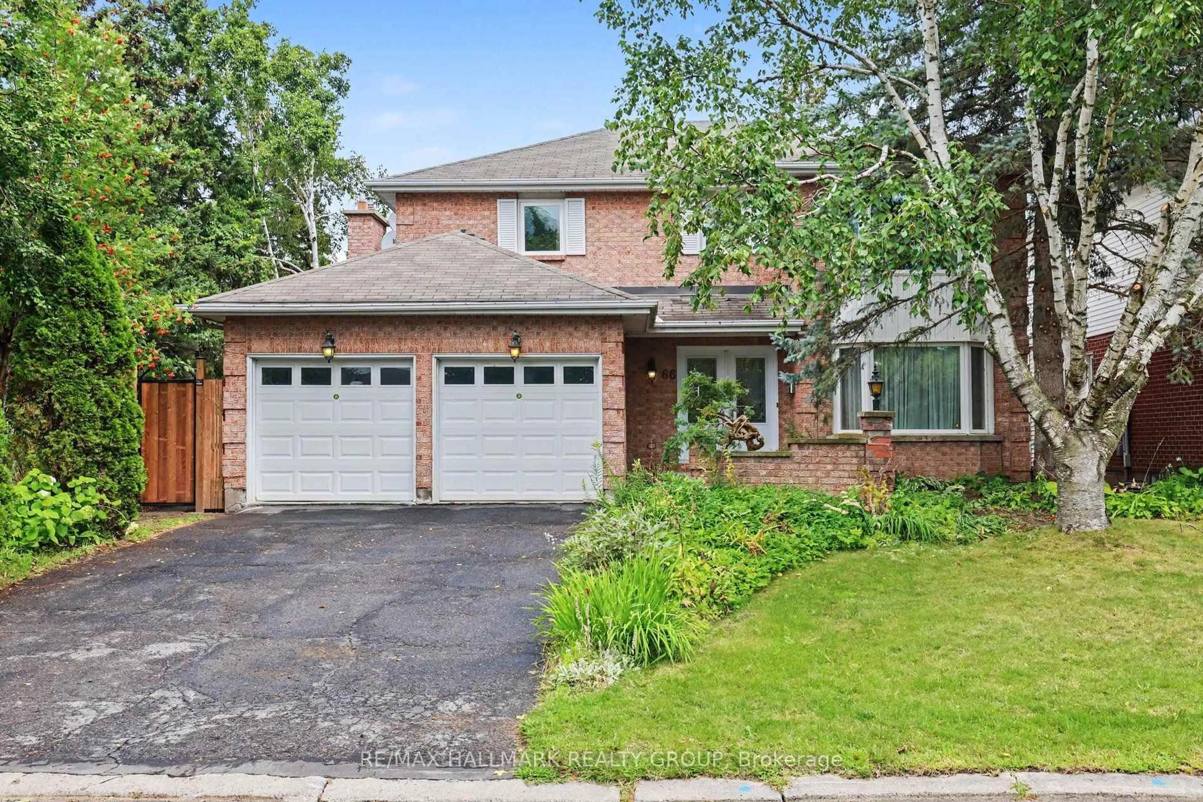 Home with brick exterior material, street for 66 Bateman Dr, Ottawa Ontario K2G 5H5