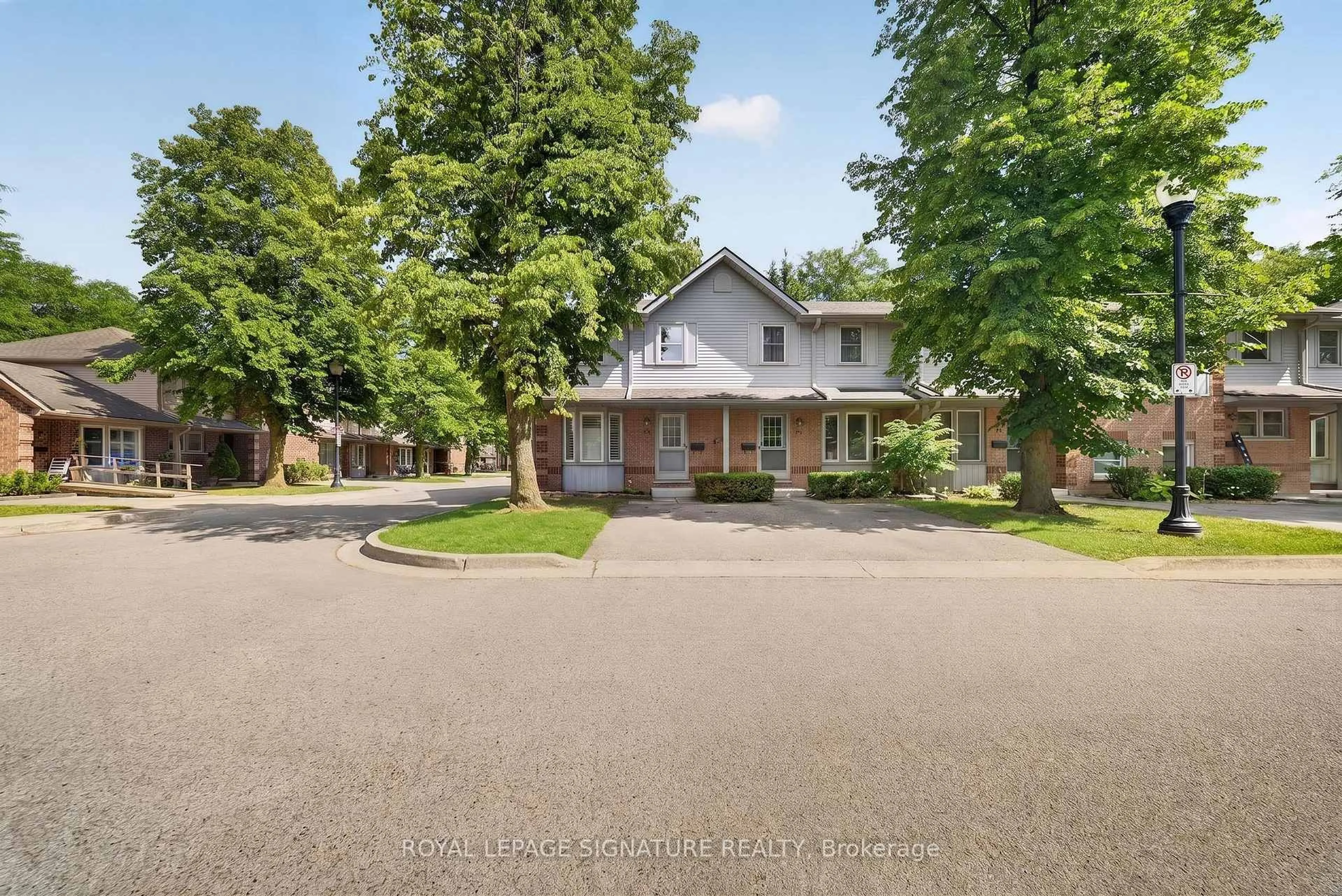A pic from outside/outdoor area/front of a property/back of a property/a pic from drone, street for 180 Marksam Rd #43, Guelph Ontario N1H 8G5