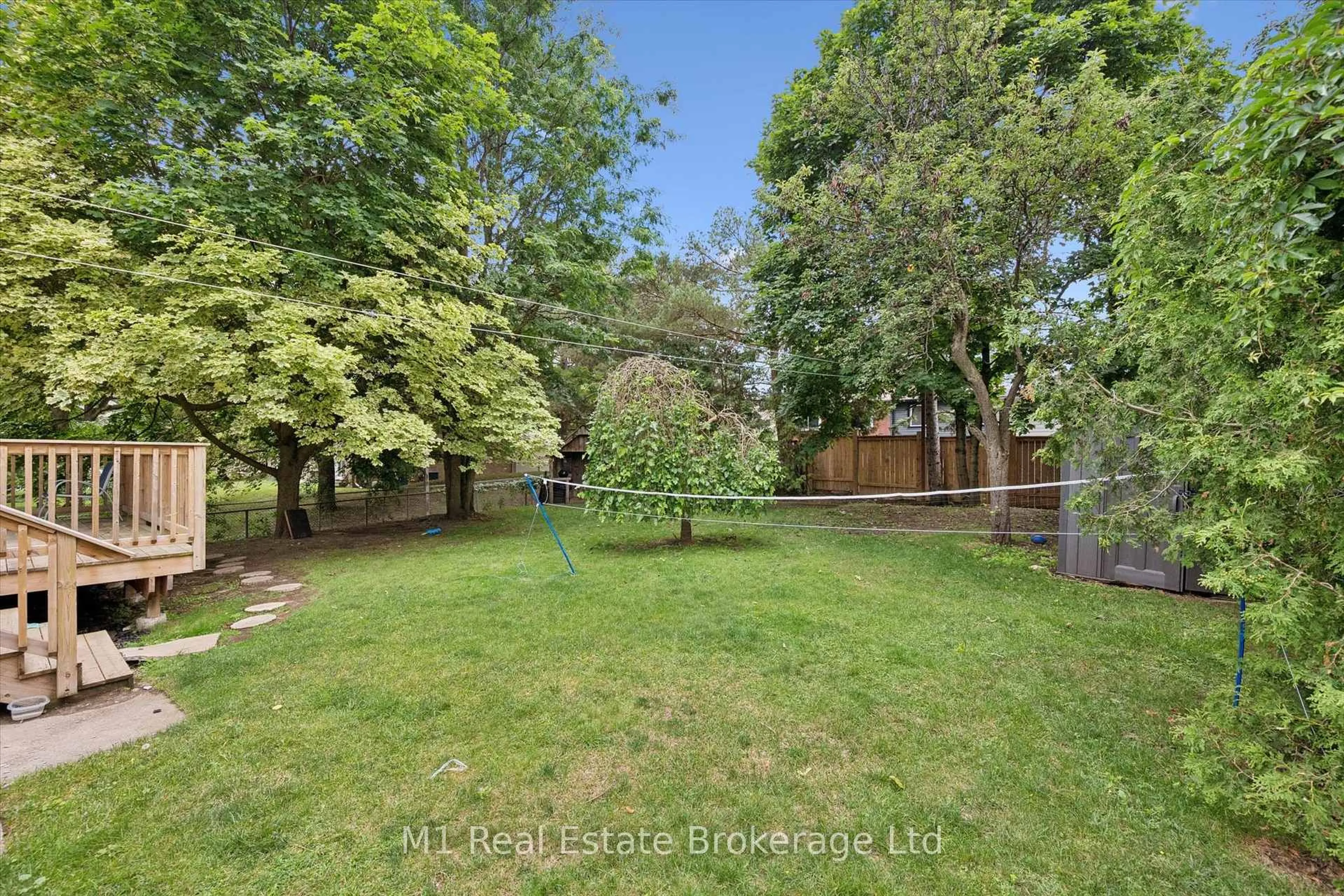 A pic from outside/outdoor area/front of a property/back of a property/a pic from drone, forest/trees view for 53 Janefield Ave, Guelph Ontario N1G 2L4