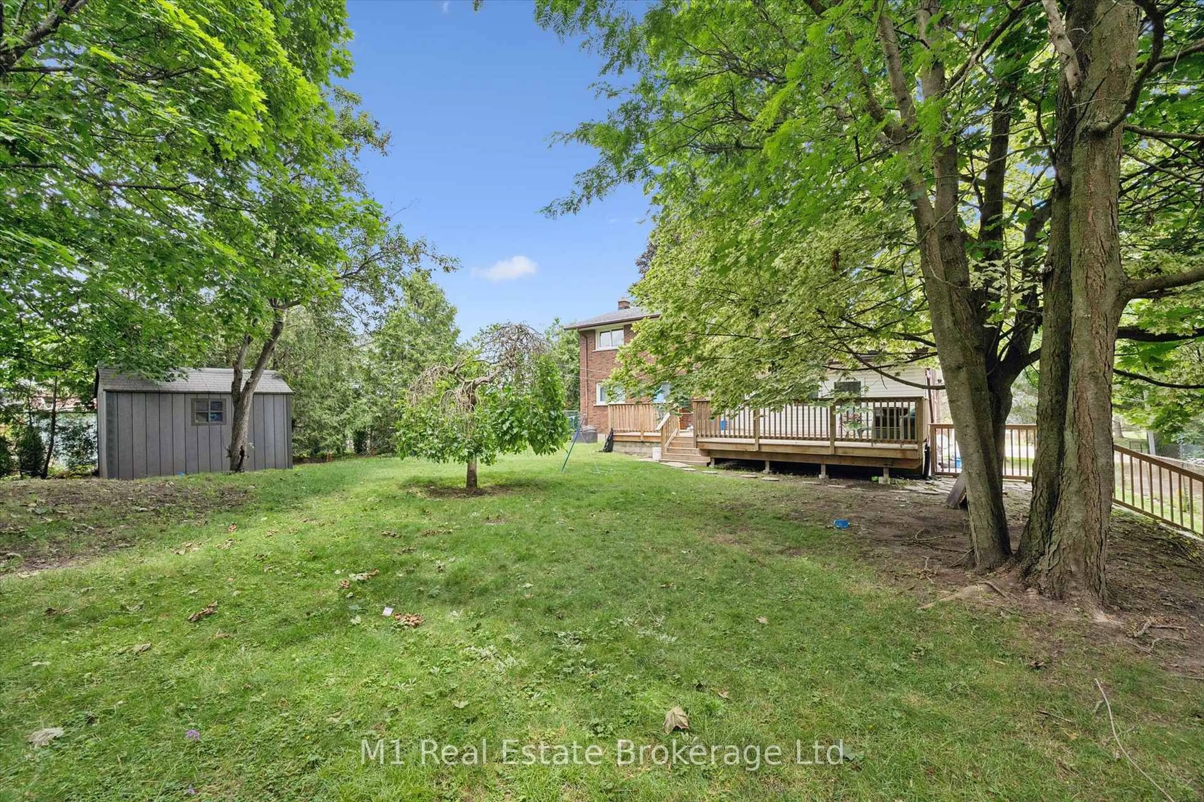 A pic from outside/outdoor area/front of a property/back of a property/a pic from drone, forest/trees view for 53 Janefield Ave, Guelph Ontario N1G 2L4