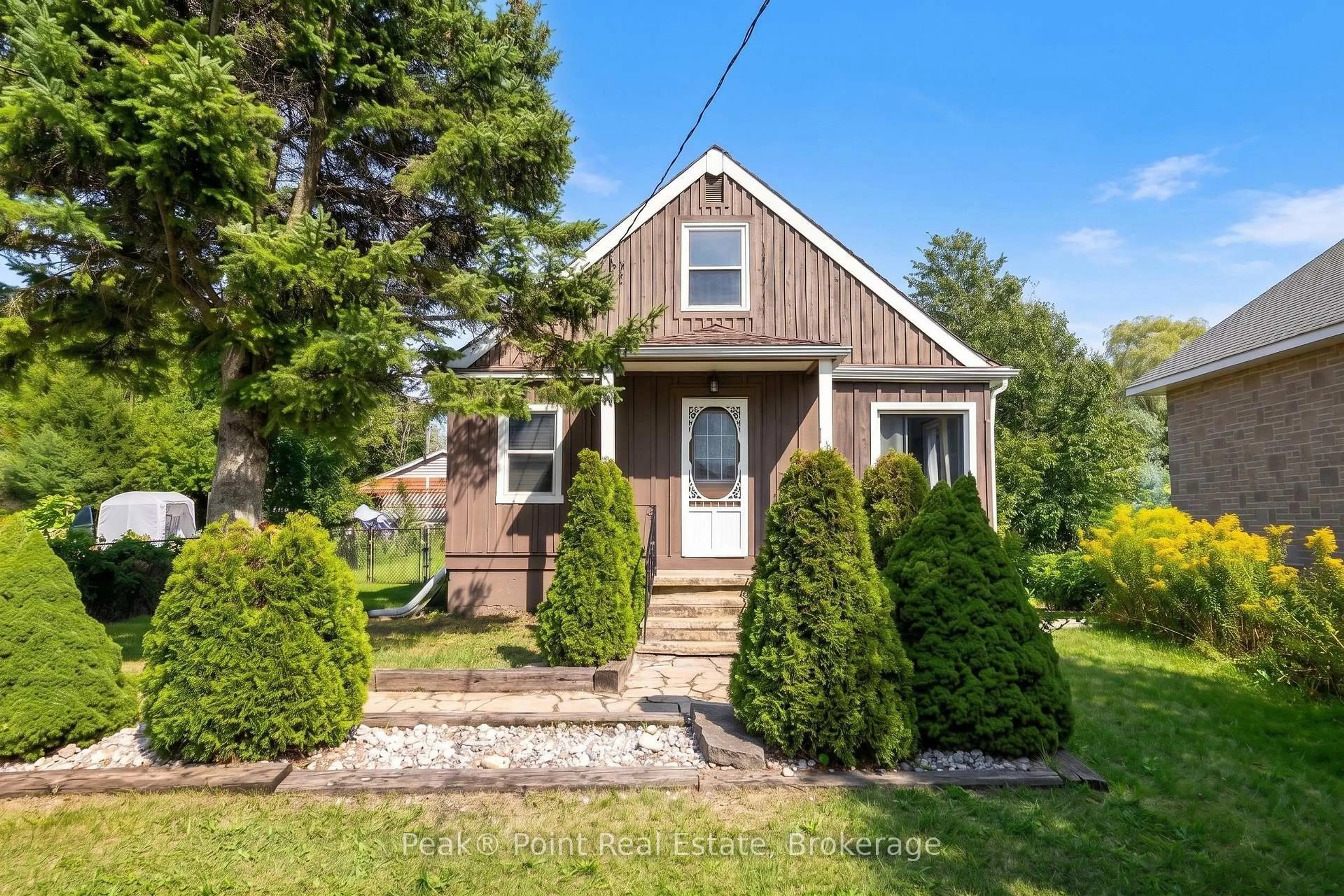 Home with vinyl exterior material, street for 579 John St, South Bruce Peninsula Ontario N0H 2T0