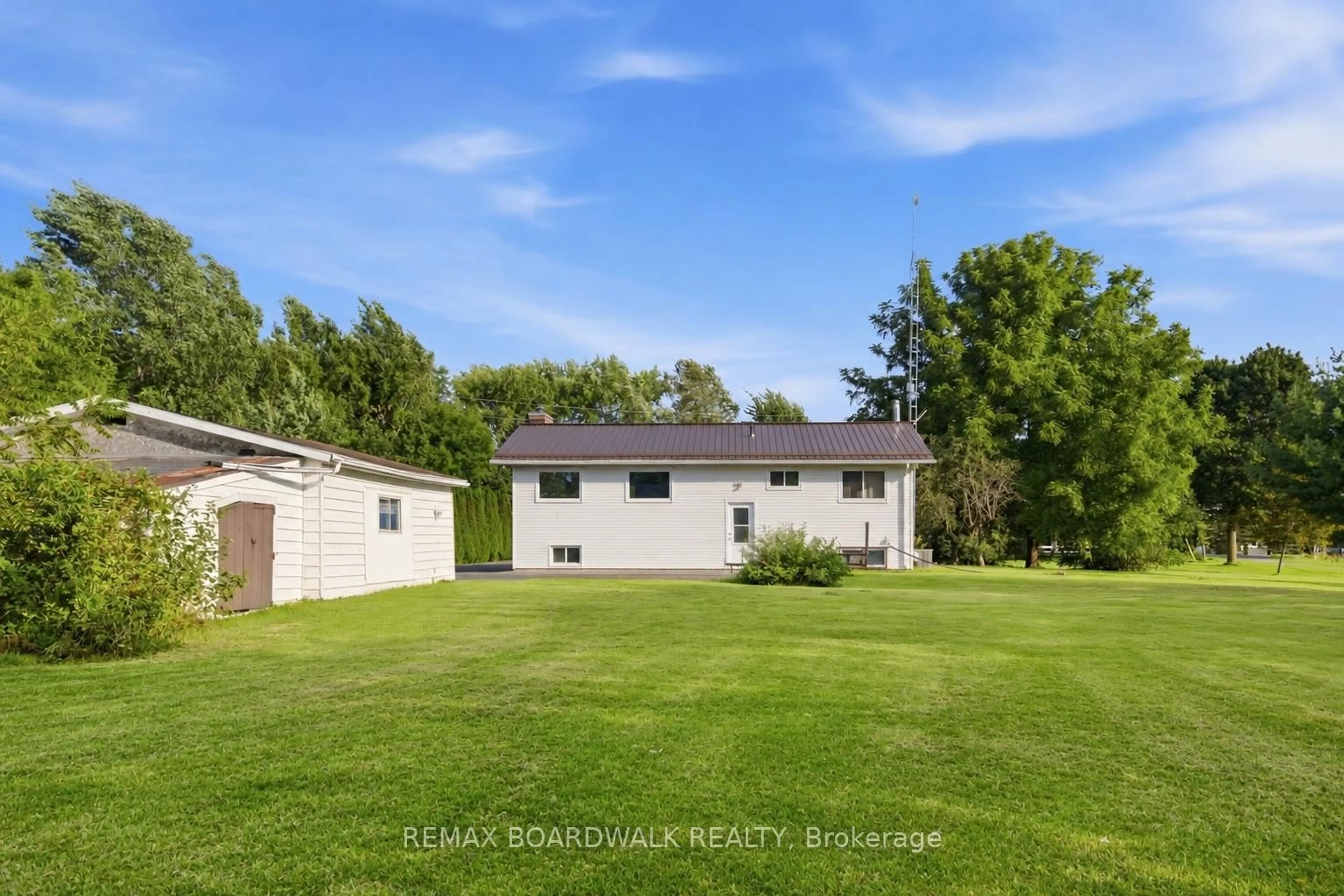 A pic from outside/outdoor area/front of a property/back of a property/a pic from drone, water/lake/river/ocean view for 2106 County Road 2 Rd, Edwardsburgh/Cardinal Ontario K0E 1T1