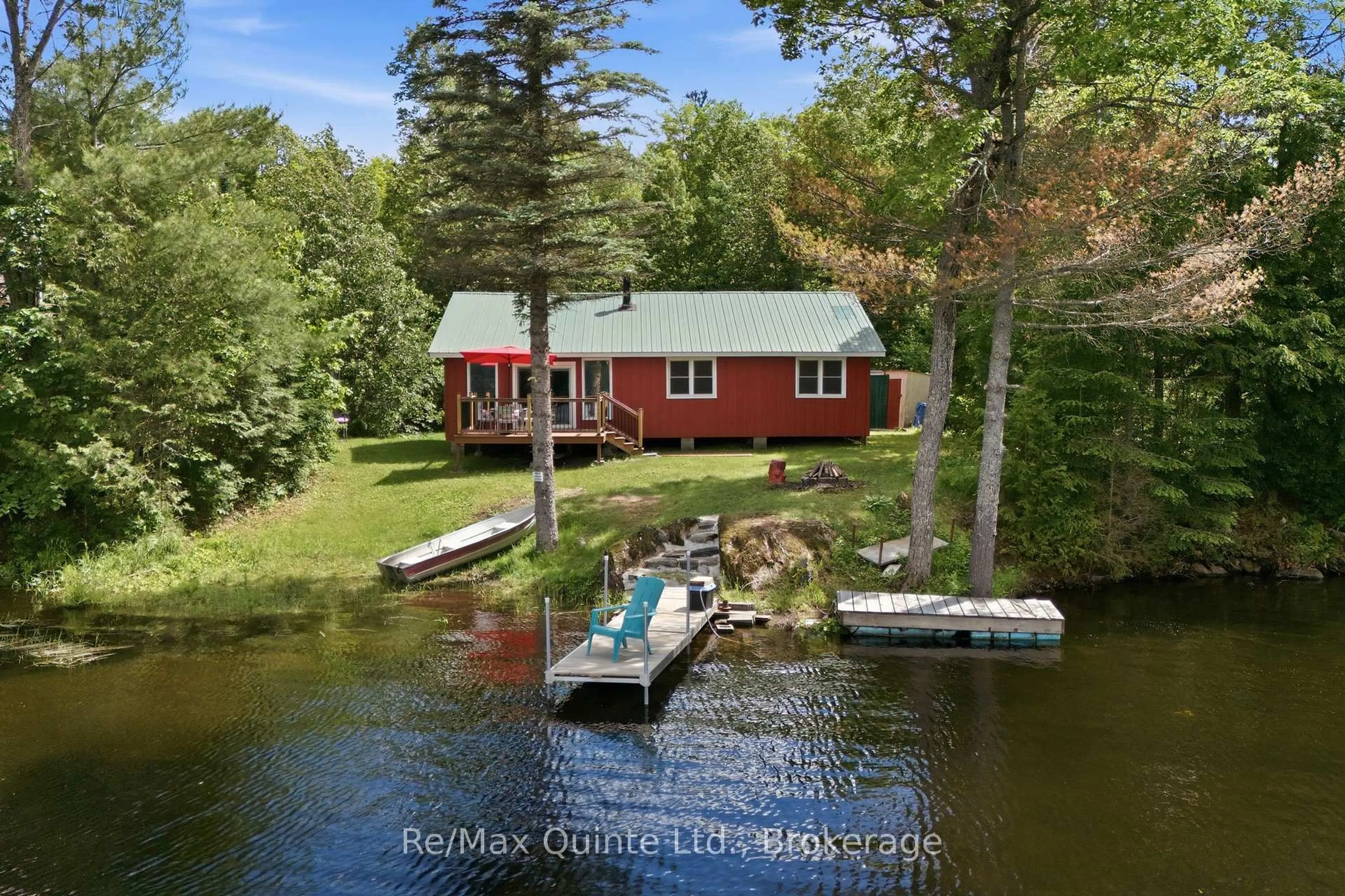 A pic from outside/outdoor area/front of a property/back of a property/a pic from drone, water/lake/river/ocean view for 485 Glanmire Lake Lane, Madoc Ontario K0K 1Y0
