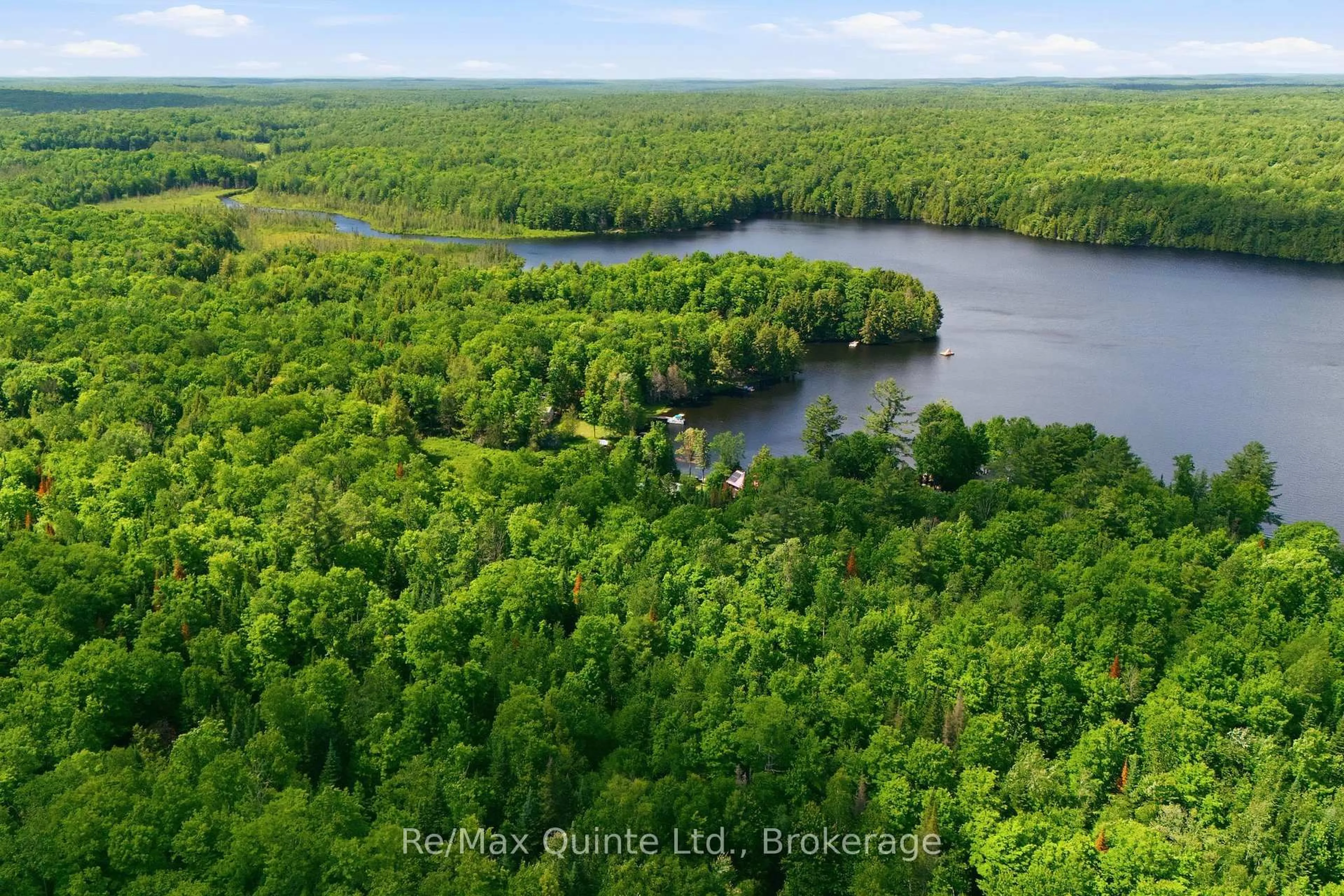 A pic from outside/outdoor area/front of a property/back of a property/a pic from drone, water/lake/river/ocean view for 485 Glanmire Lake Lane, Madoc Ontario K0K 1Y0