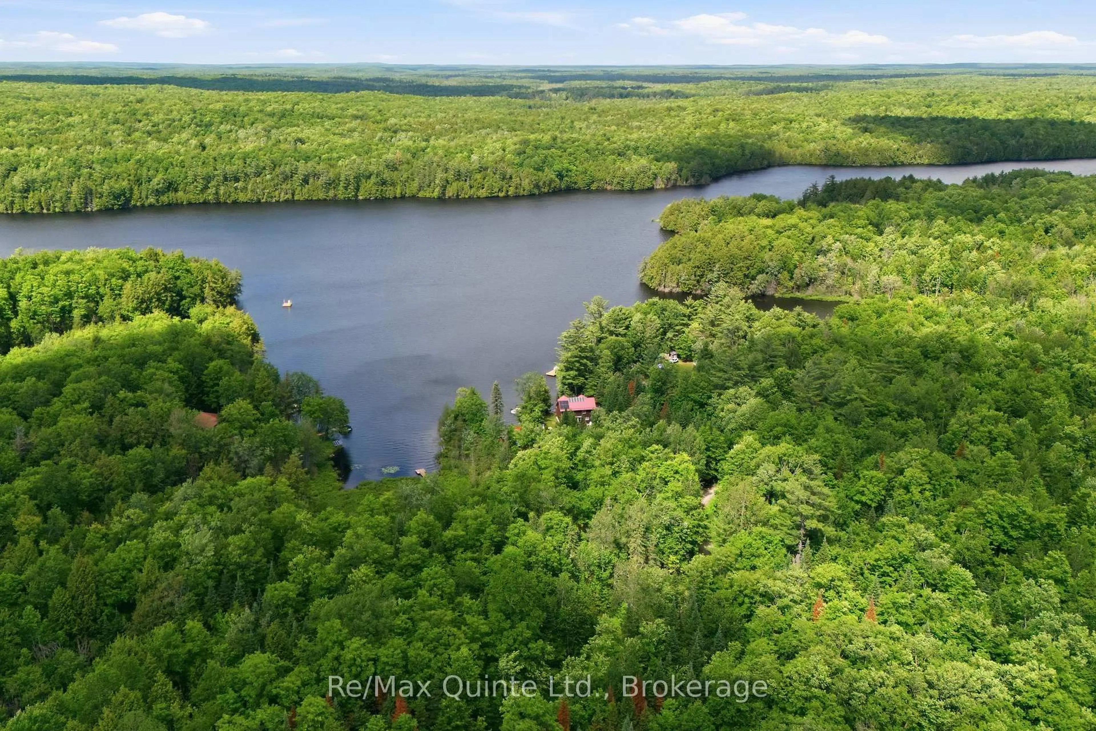 A pic from outside/outdoor area/front of a property/back of a property/a pic from drone, water/lake/river/ocean view for 485 Glanmire Lake Lane, Madoc Ontario K0K 1Y0