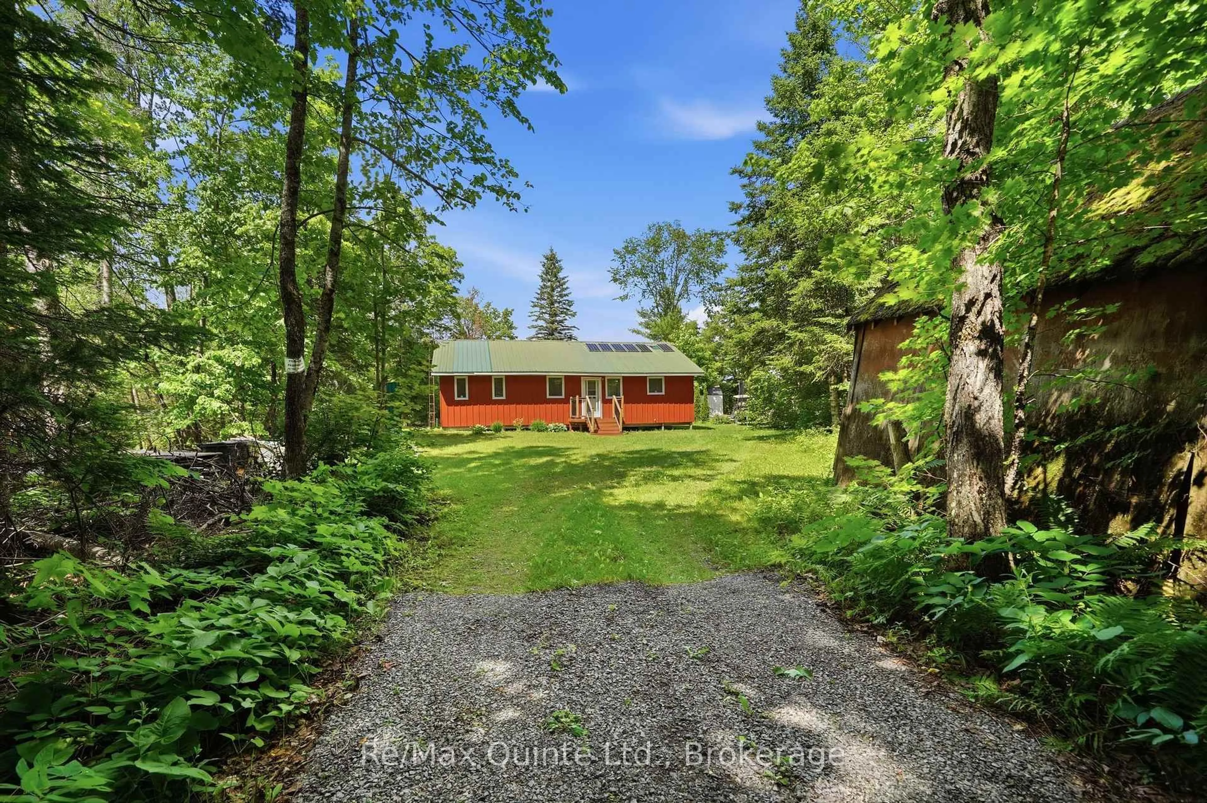 A pic from outside/outdoor area/front of a property/back of a property/a pic from drone, forest/trees view for 485 Glanmire Lake Lane, Madoc Ontario K0K 1Y0