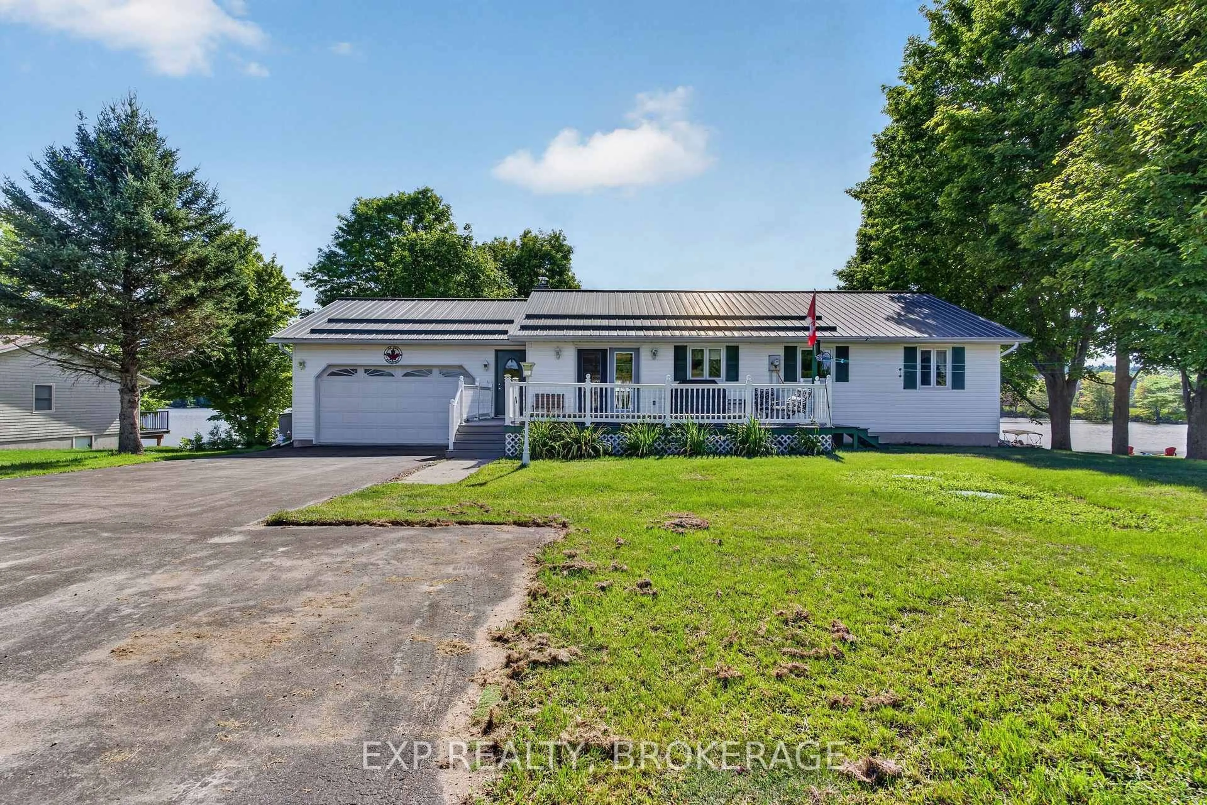 A pic from outside/outdoor area/front of a property/back of a property/a pic from drone, street for 179 BOBS LAKE LANE 11, Maberly Ontario K0H 2B0