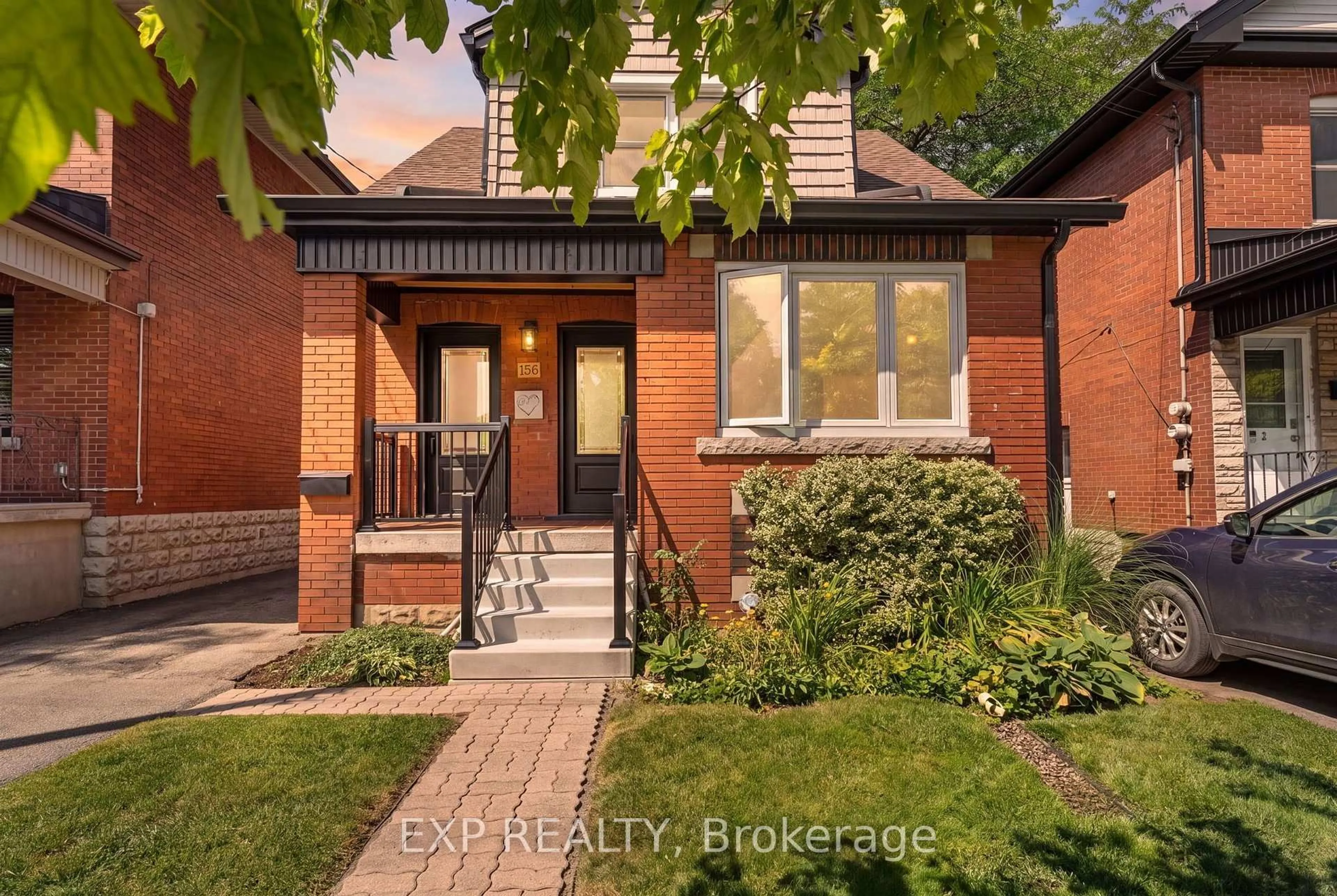 Home with brick exterior material, street for 156 Park Row, Hamilton Ontario L8K 2J8