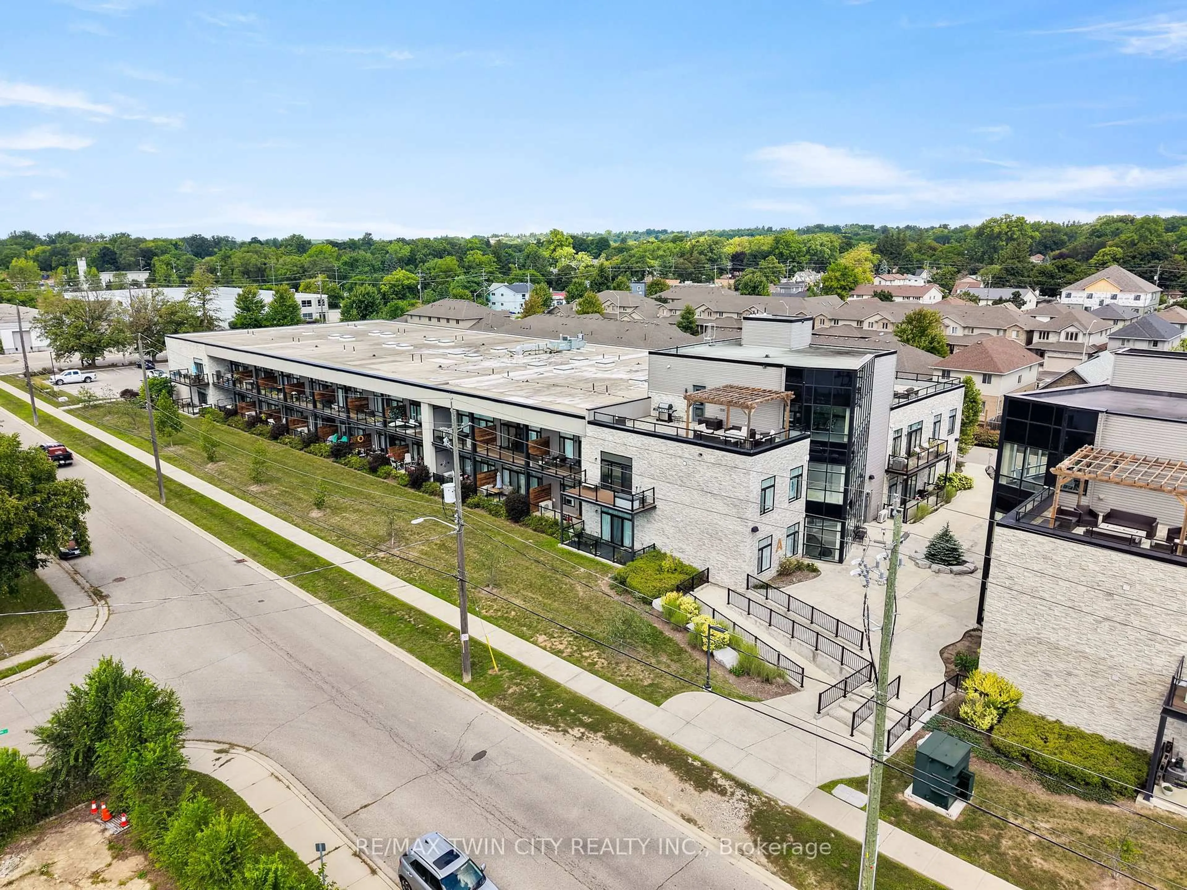 A pic from outside/outdoor area/front of a property/back of a property/a pic from drone, unknown for 85 Morrell St #207, Building A, Brantford Ontario N3T 4J6