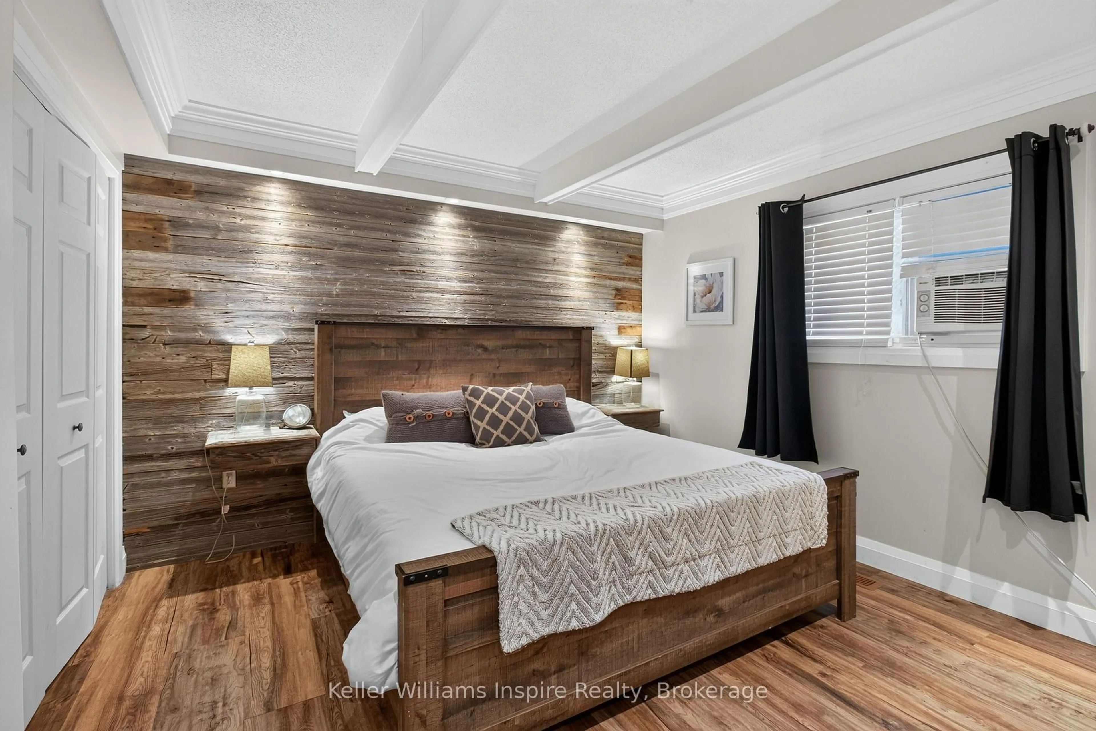 Bedroom with bed, wood/laminate floor for 1080 Pillar Lane, Perth Road Ontario K0H 2L0
