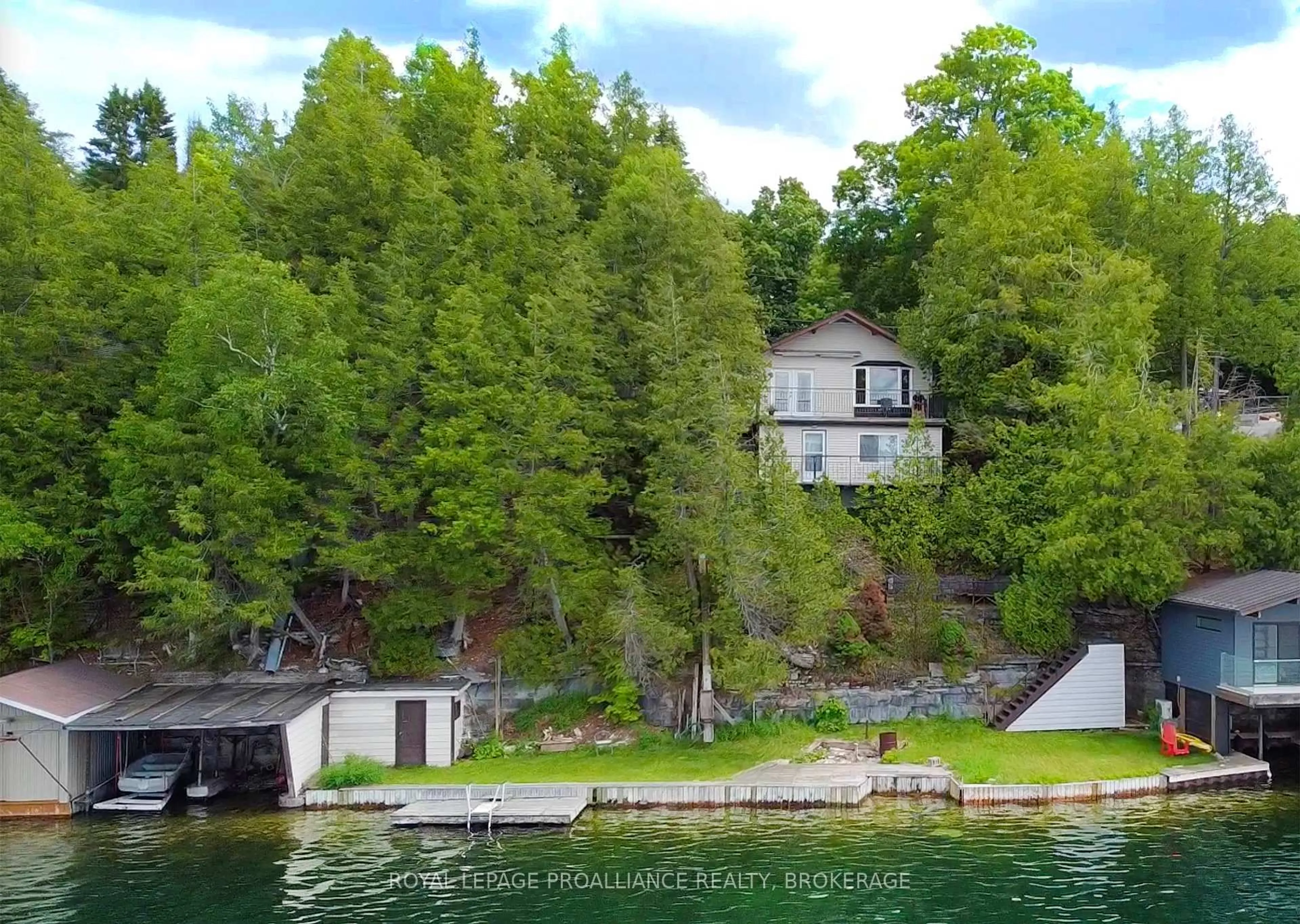 A pic from outside/outdoor area/front of a property/back of a property/a pic from drone, water/lake/river/ocean view for 4502 Red Maple Lane, Inverary Ontario K0H 1X0