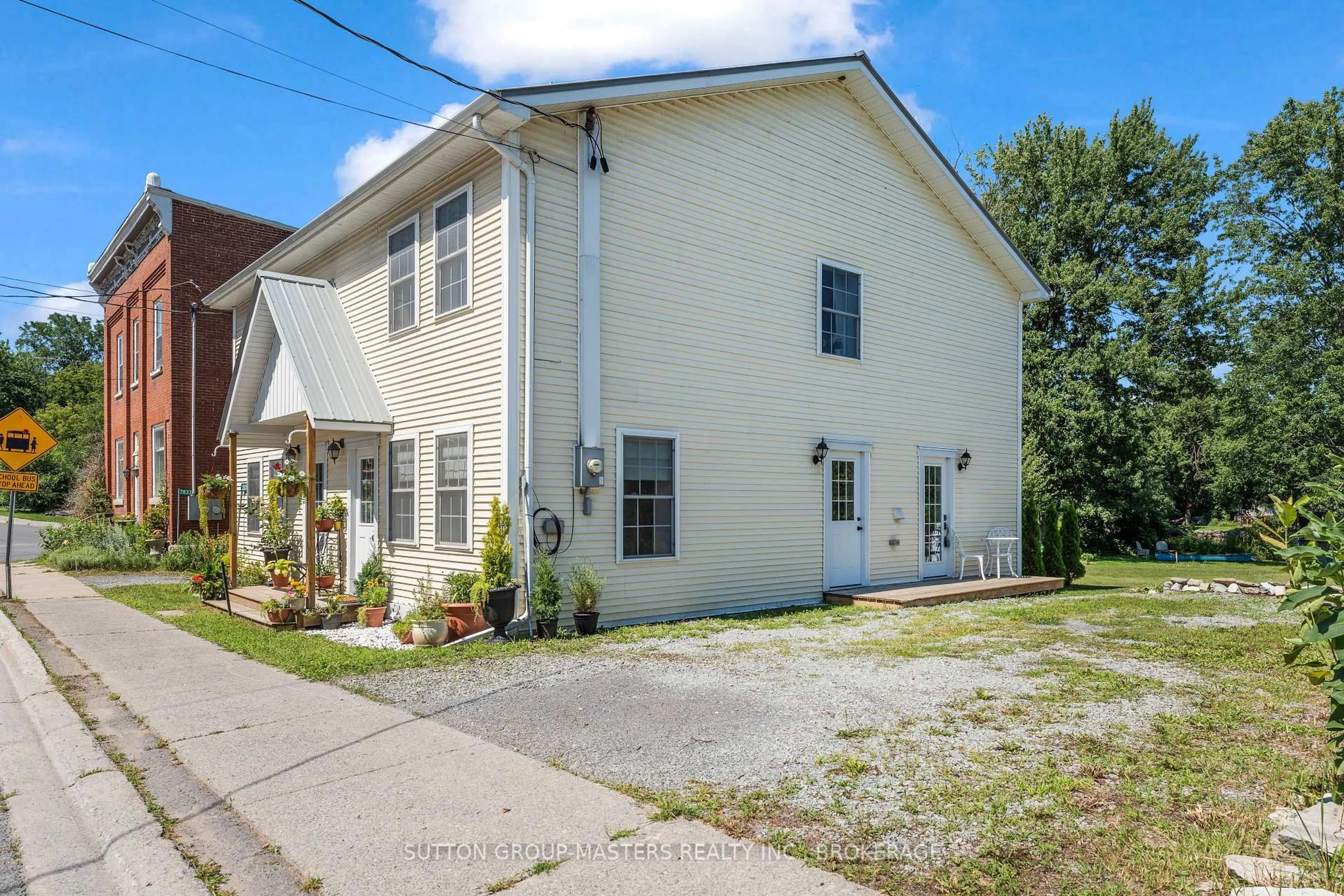 A pic from outside/outdoor area/front of a property/back of a property/a pic from drone, street for 2829-2831 County Rd 6 Rd, Yarker Ontario K0K 3N0