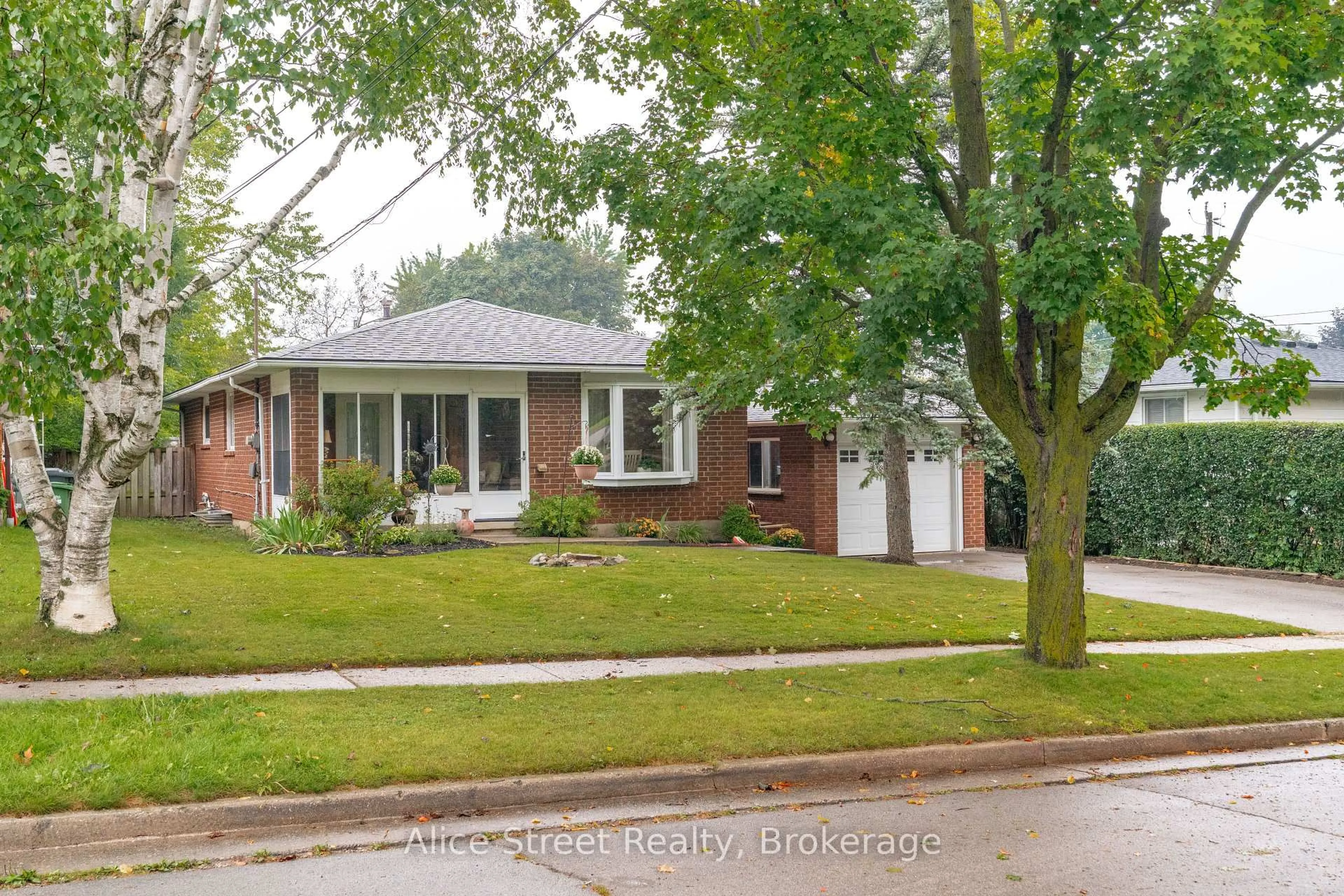 Home with brick exterior material, street for 5 Glenbrook Dr, Guelph Ontario N1E 1B1